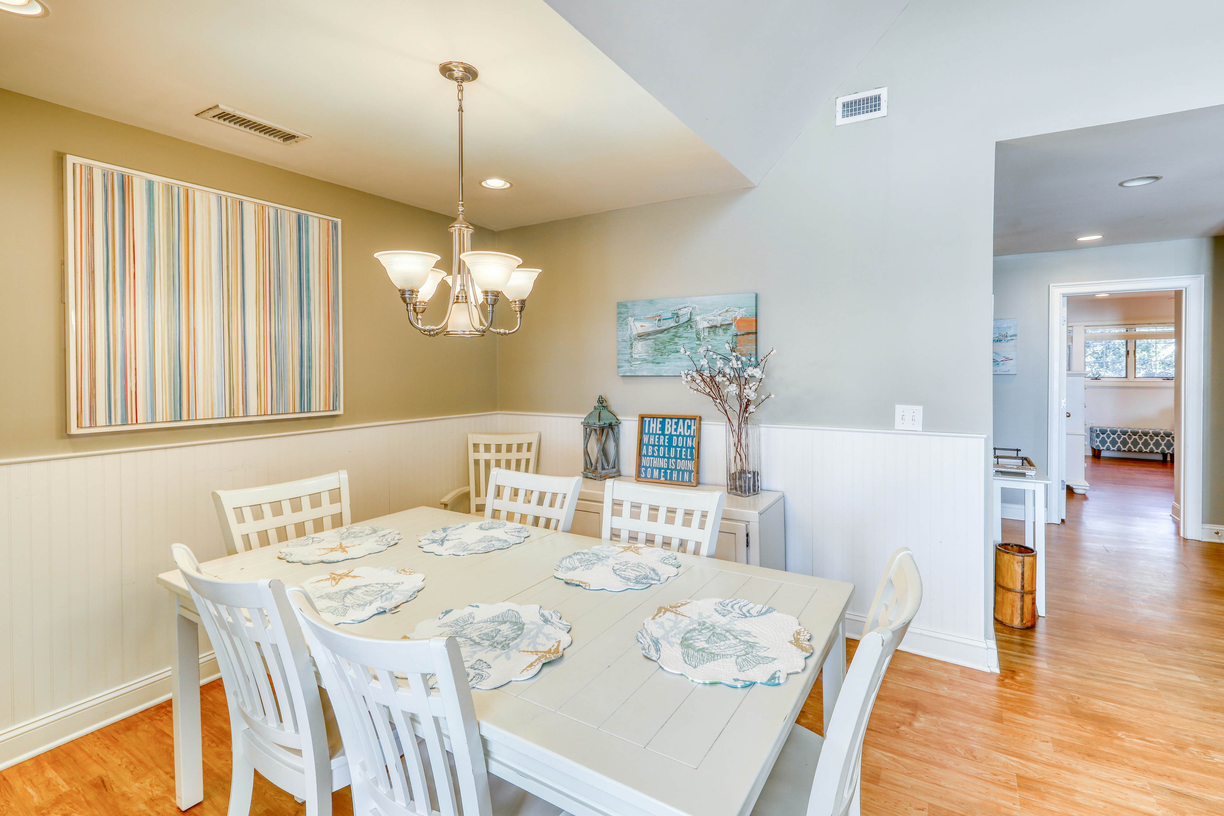 Dog-Friendly Waterfront Condo with Furnished Deck & Beach Views