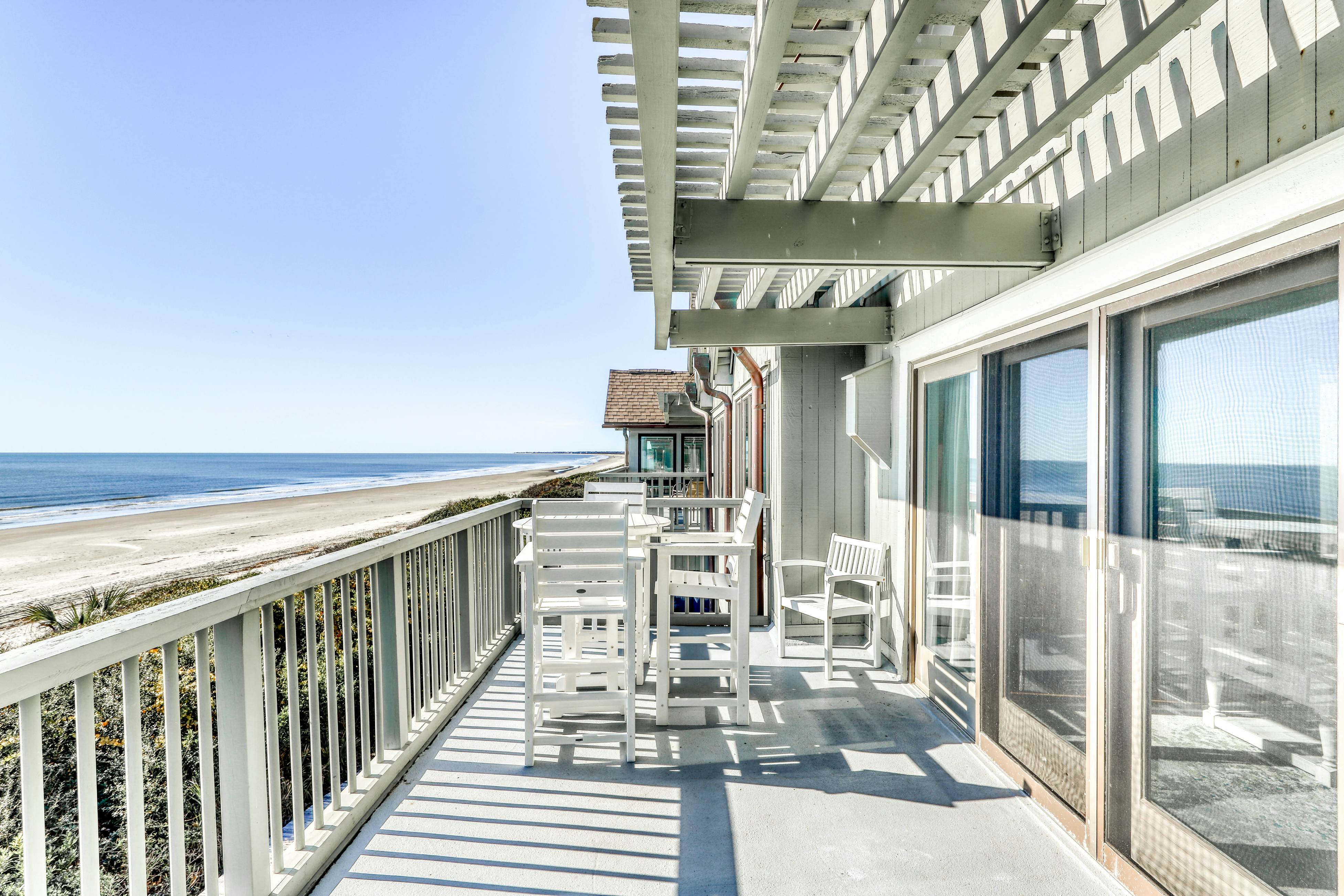 Dog-Friendly Waterfront Condo with Furnished Deck & Beach Views