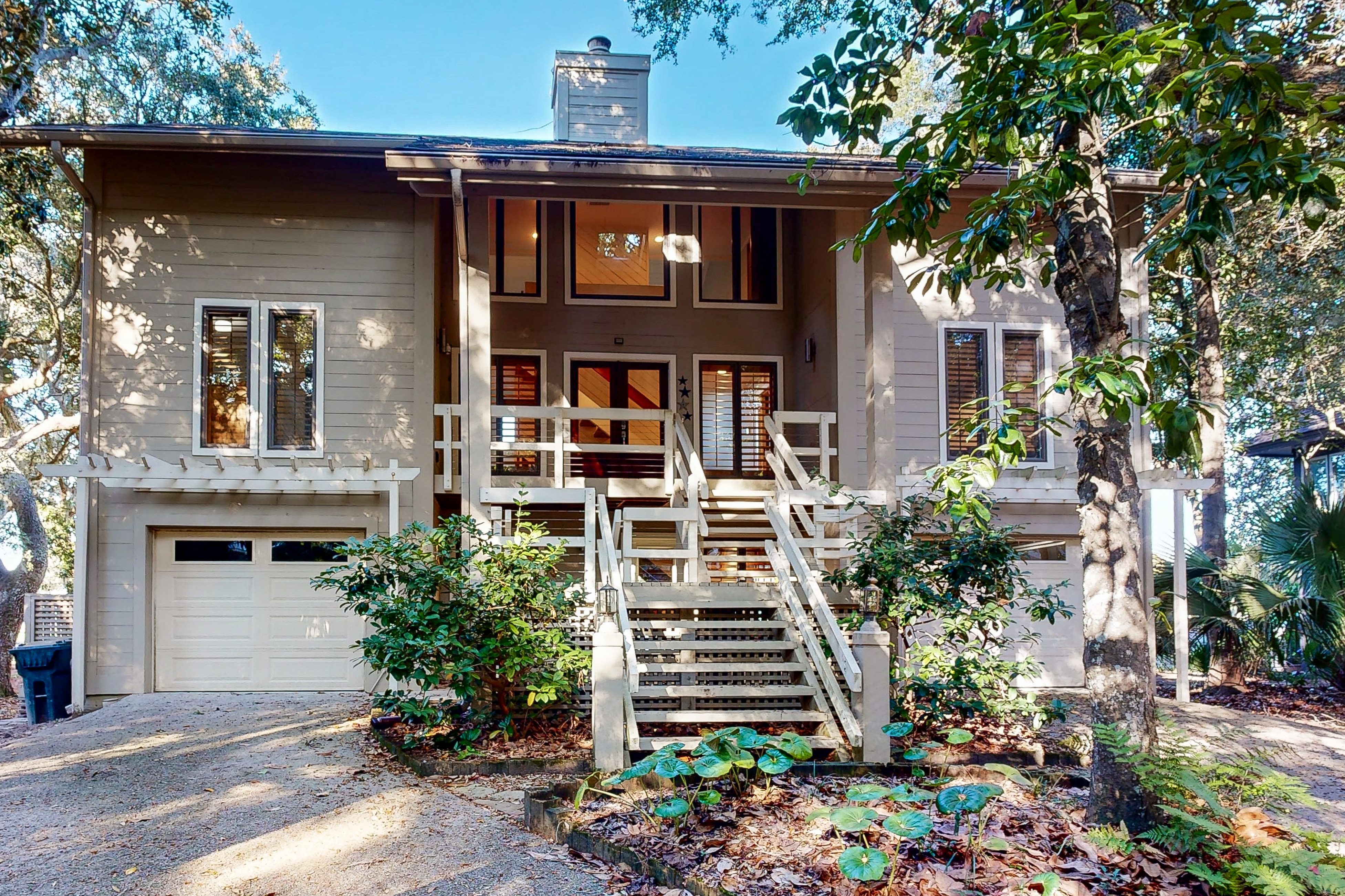 Stunning Home with river marsh views, golf course views and close beach access