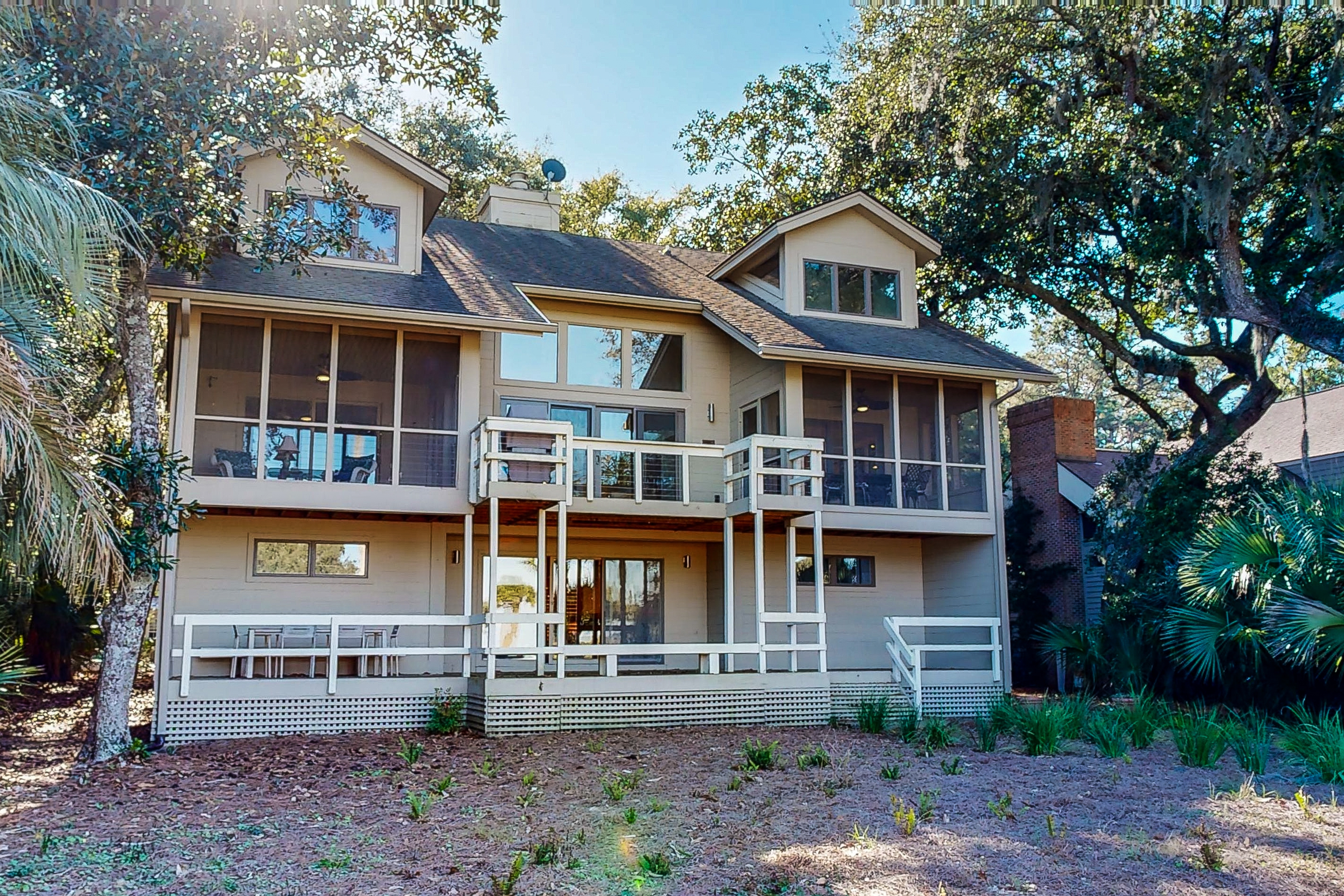 Stunning Home with river marsh views, golf course views and close beach access
