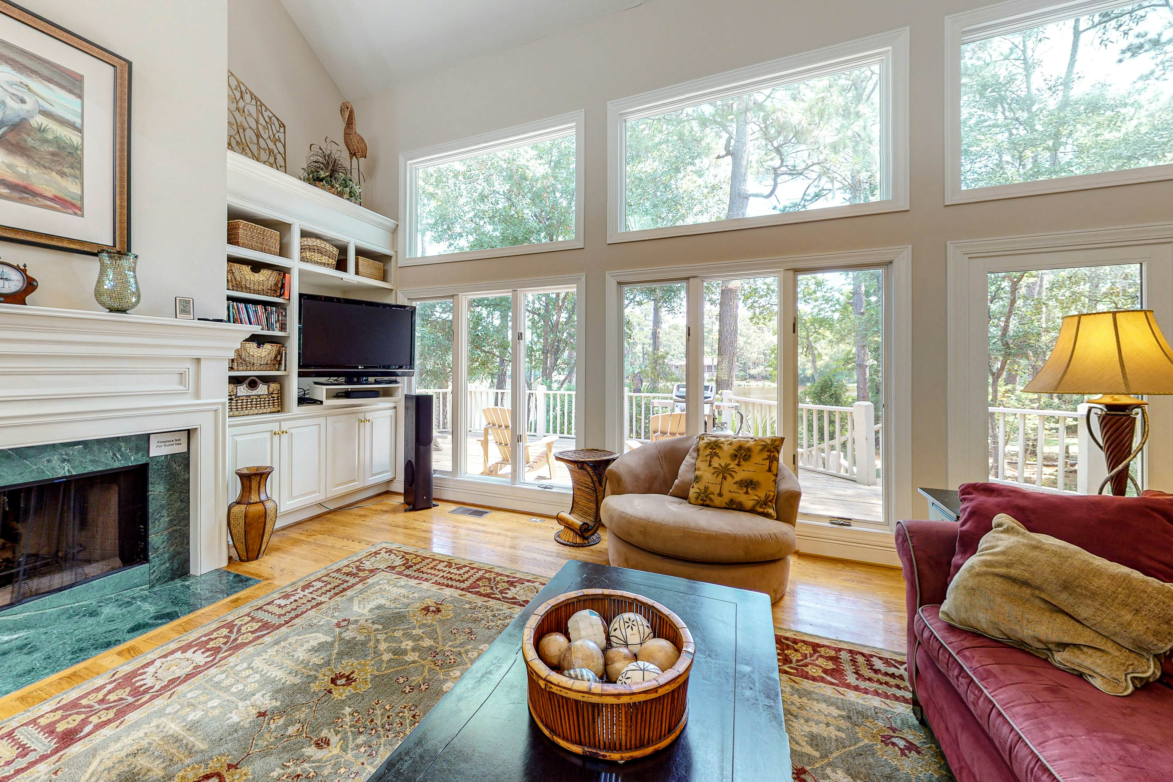 Updated island estate with serene lagoon views & 2 decks - bike to beach