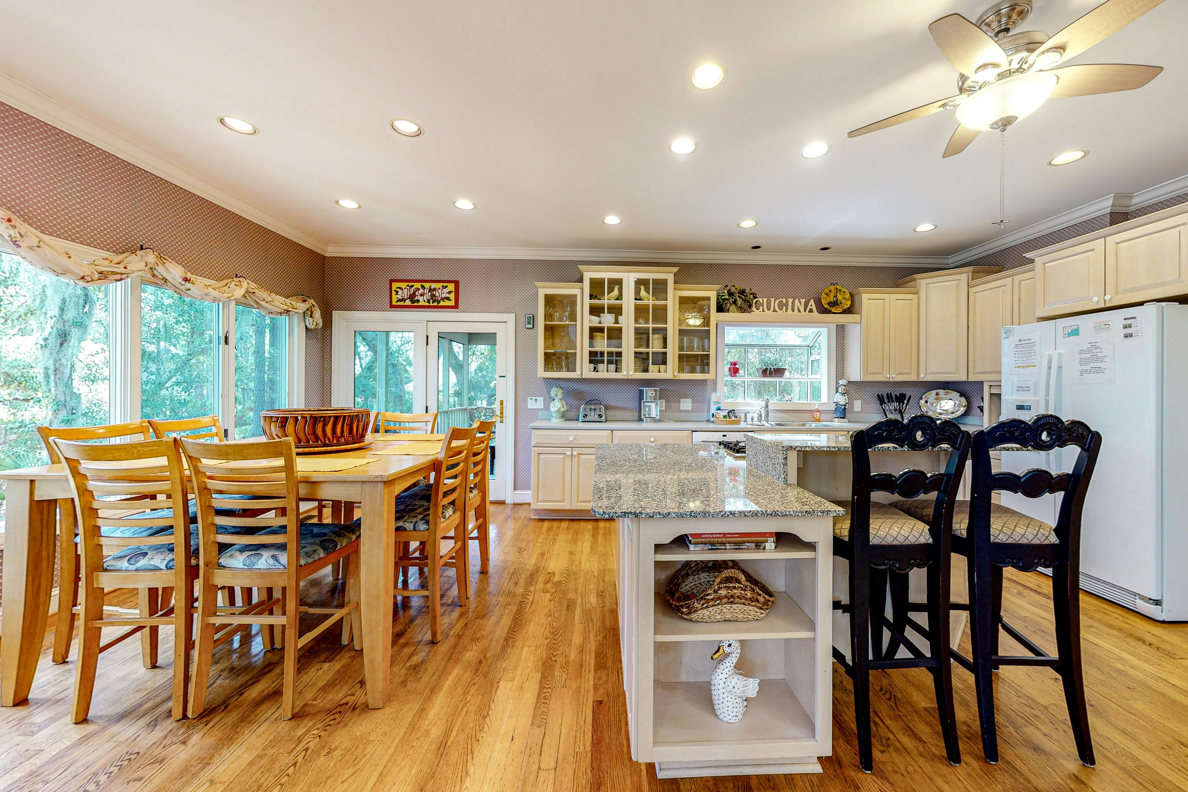 Updated island estate with serene lagoon views & 2 decks - bike to beach