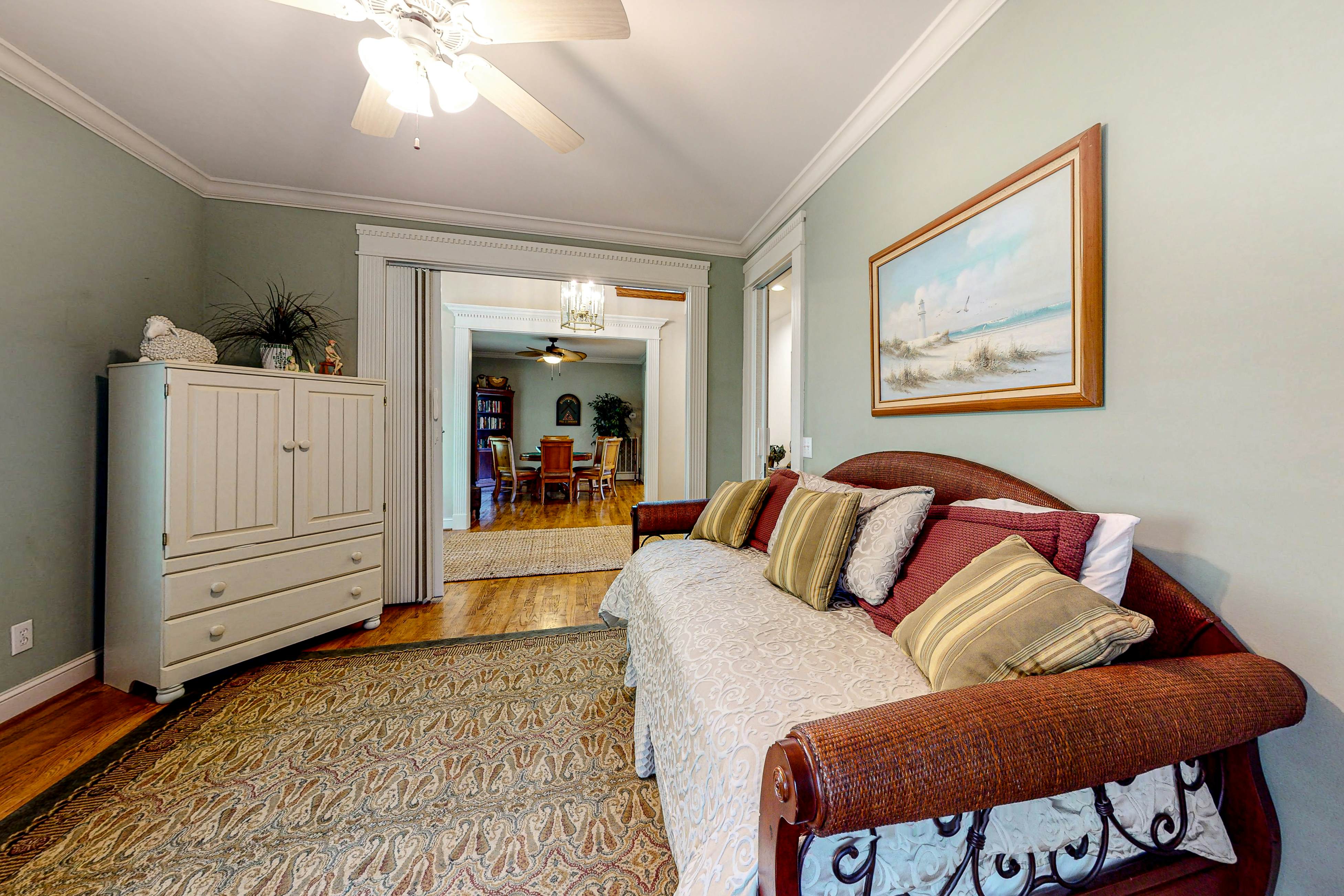 Updated island estate with serene lagoon views & 2 decks - bike to beach