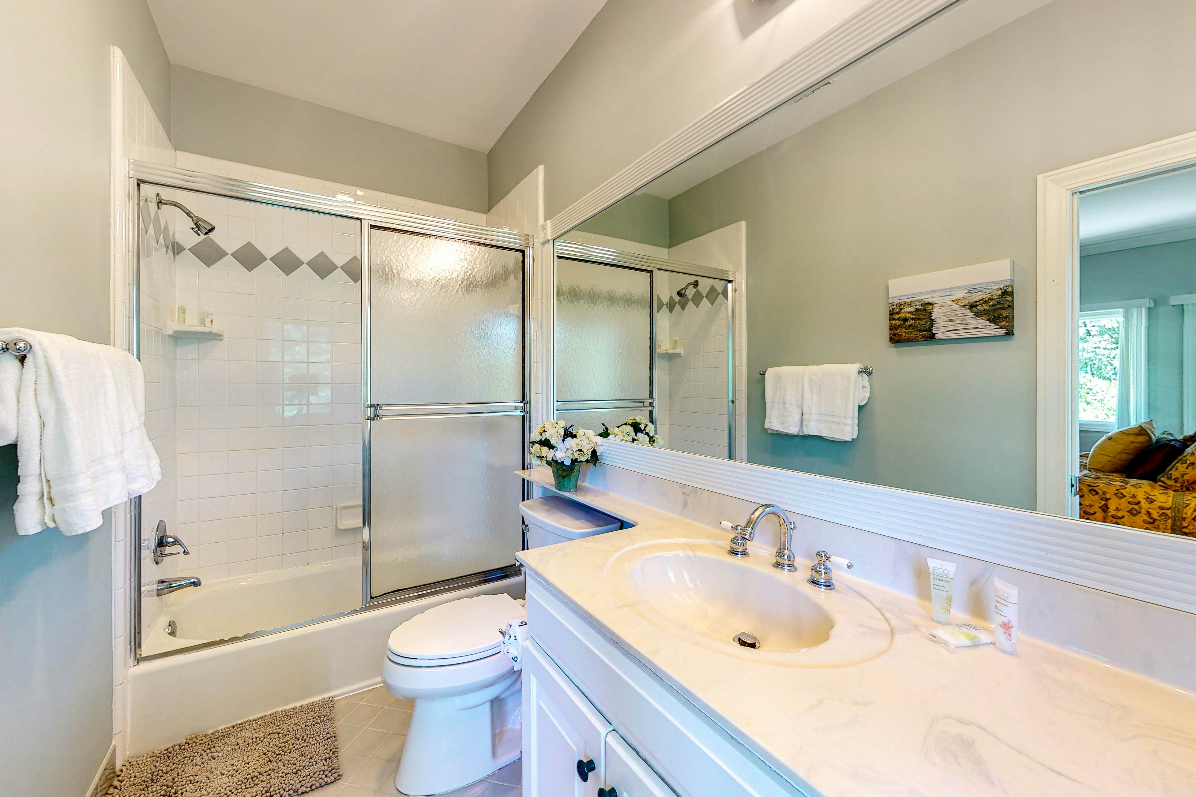 Updated island estate with serene lagoon views & 2 decks - bike to beach