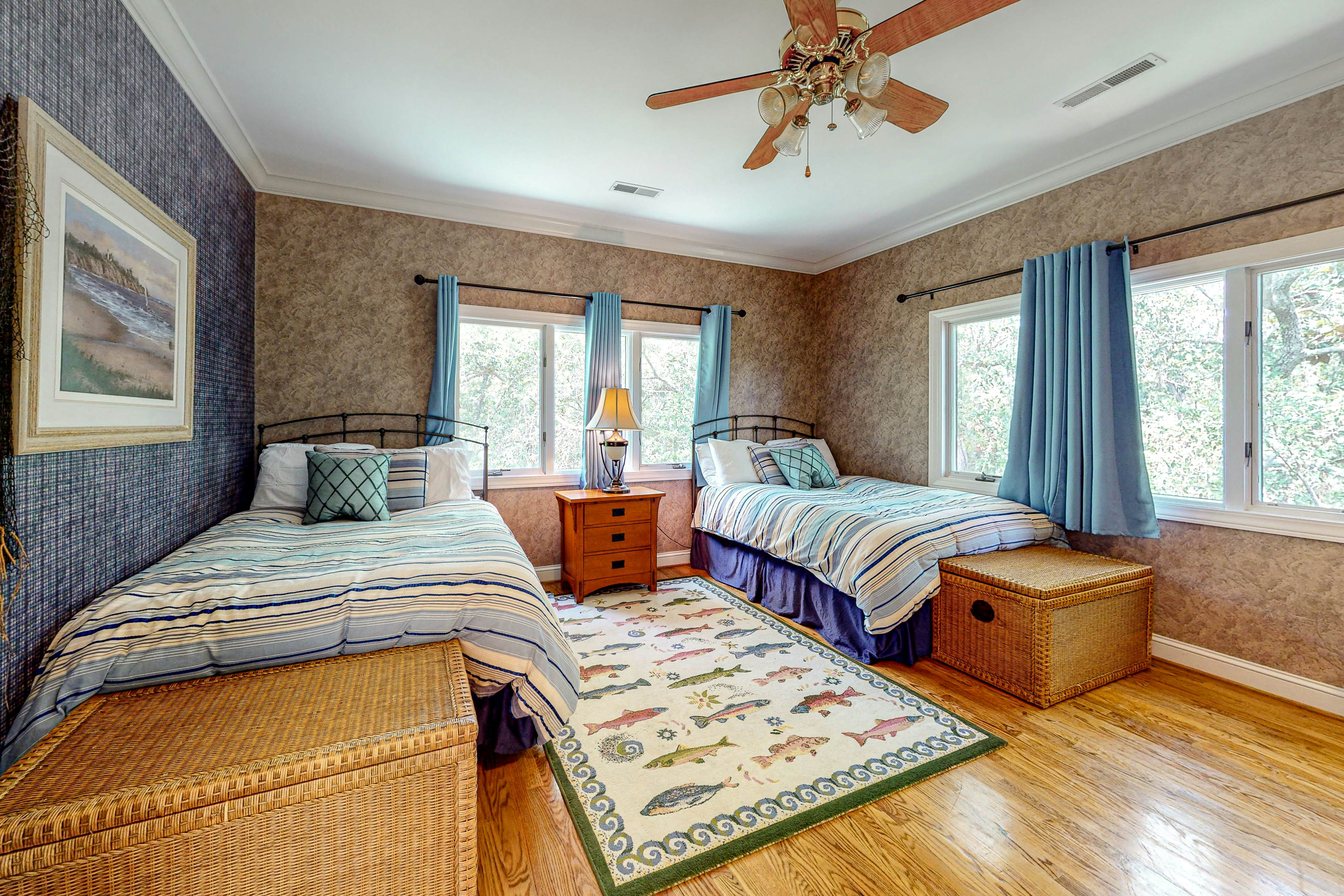 Updated island estate with serene lagoon views & 2 decks - bike to beach