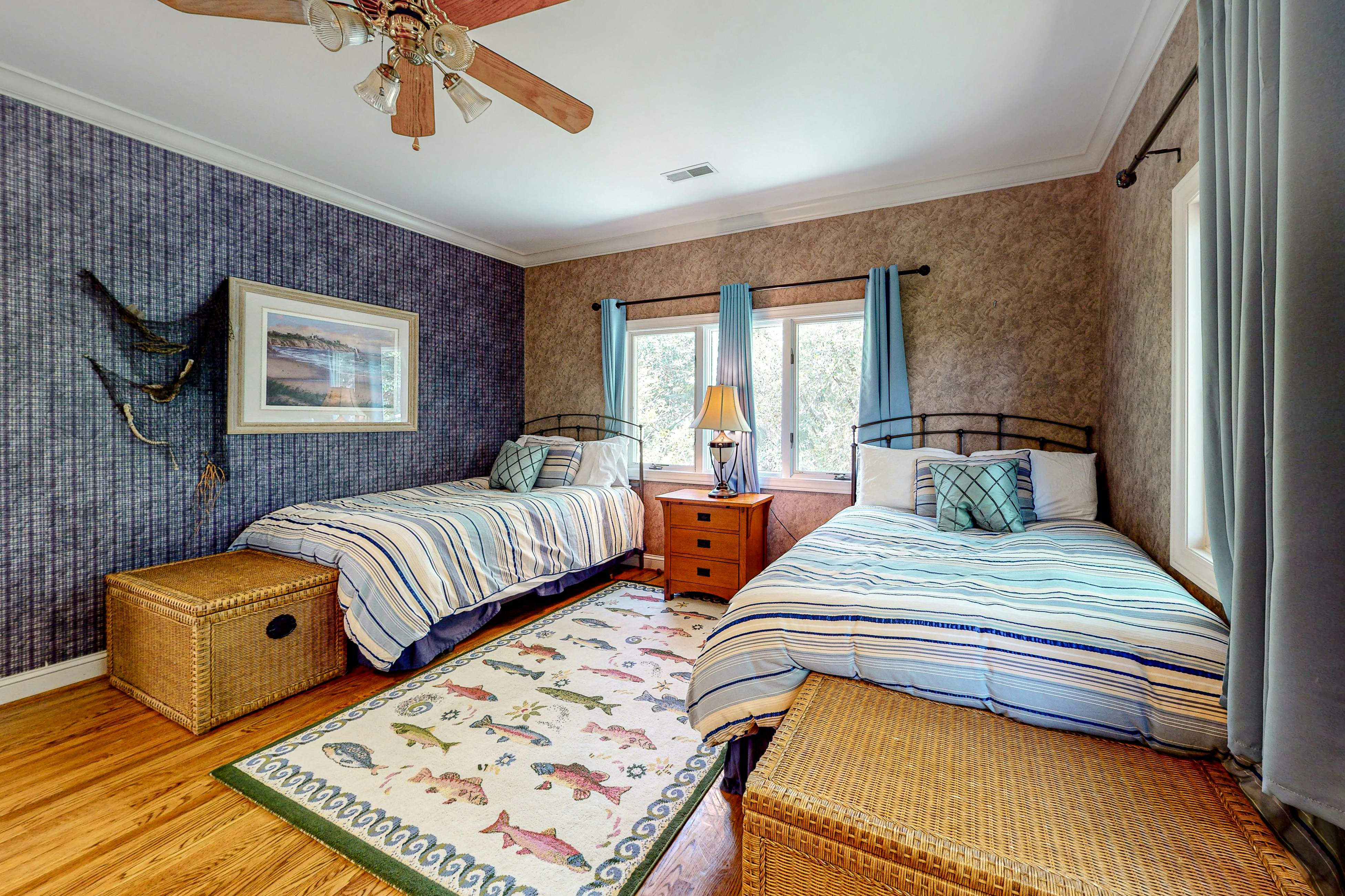 Updated island estate with serene lagoon views & 2 decks - bike to beach