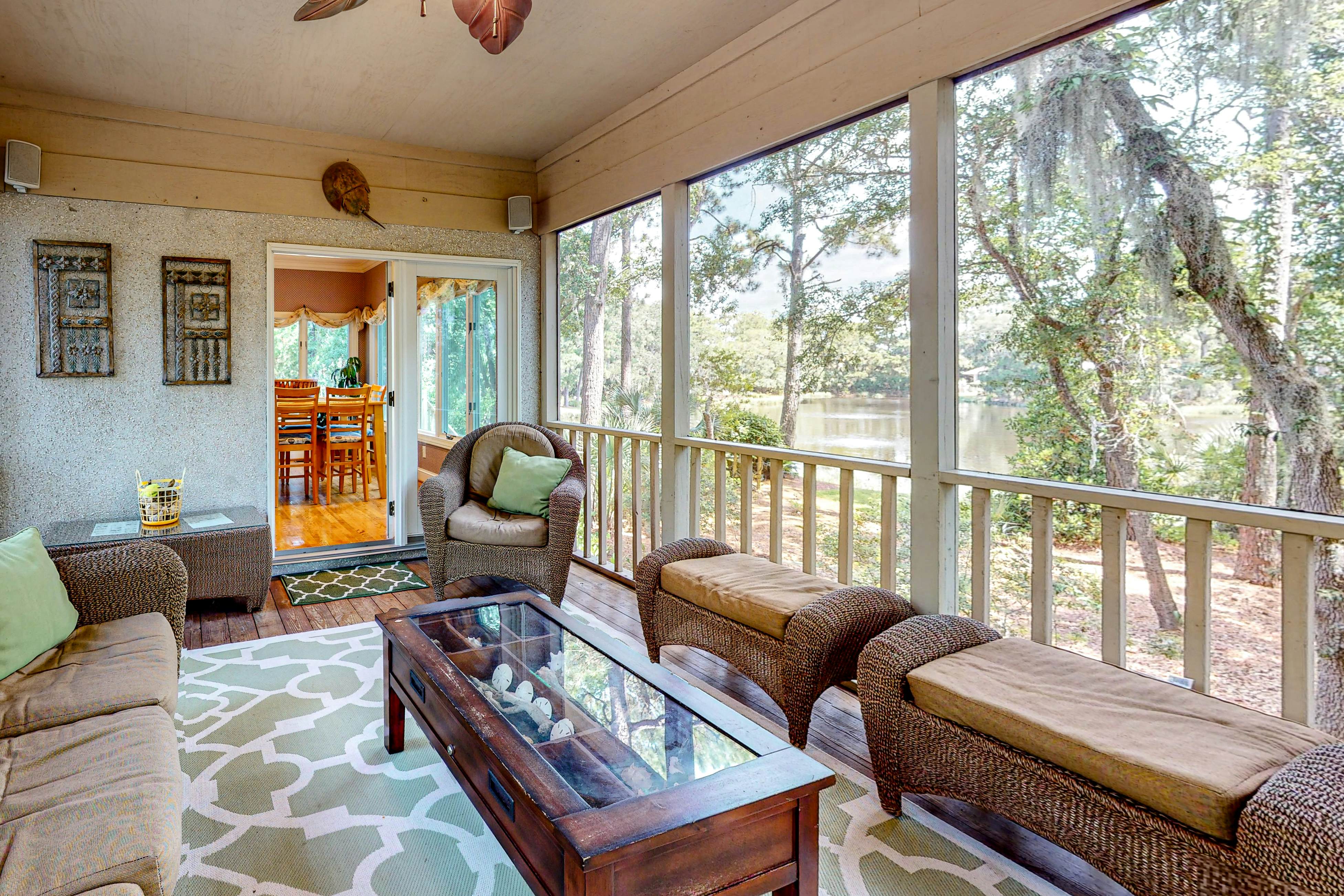 Updated island estate with serene lagoon views & 2 decks - bike to beach