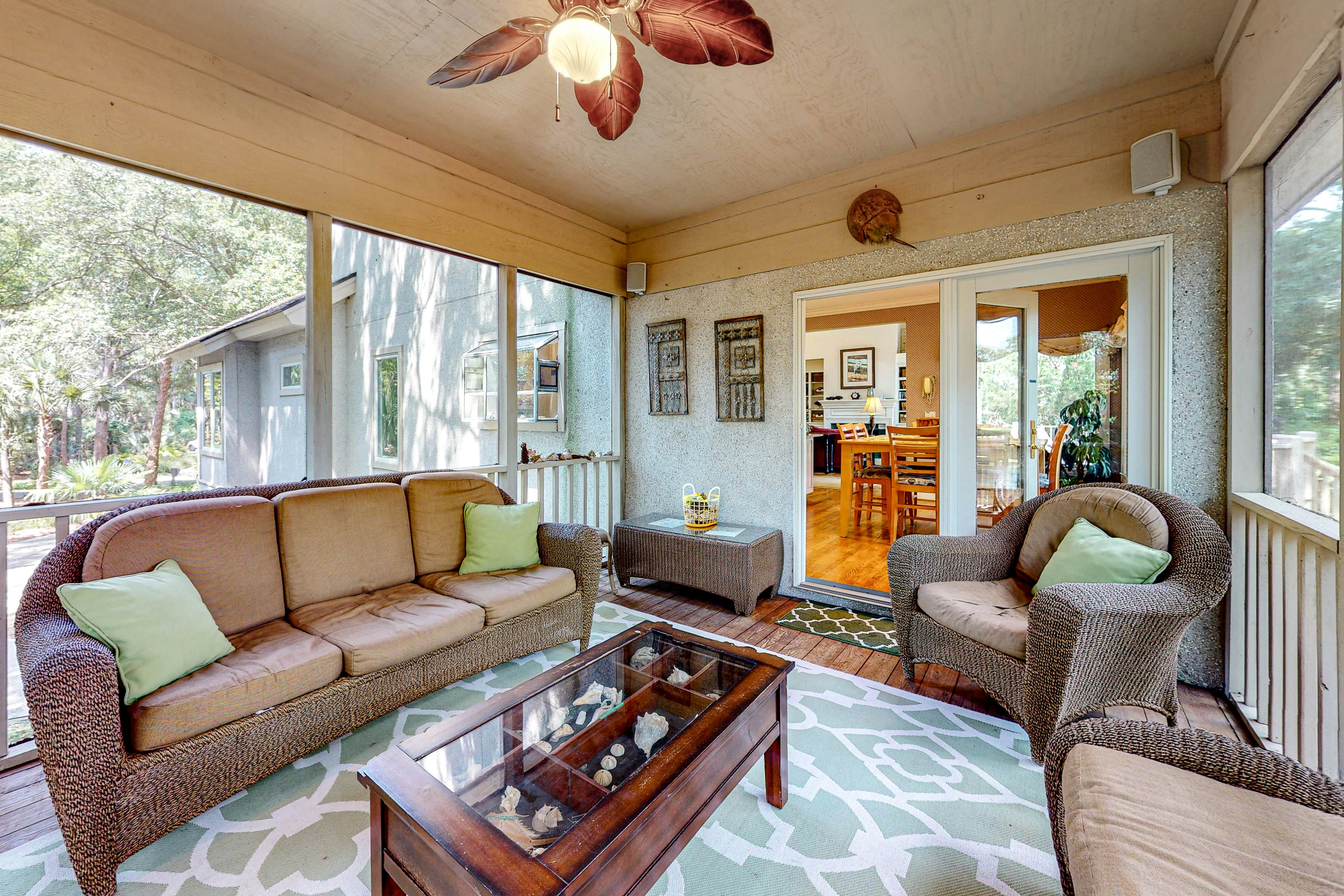 Updated island estate with serene lagoon views & 2 decks - bike to beach