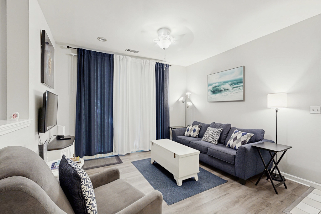 Fully-furnished first-floor condo with pool & private washer/dryer- dog-friendly