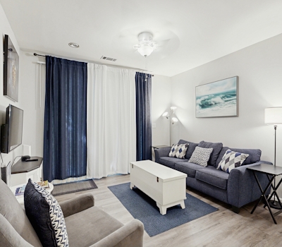 Fully-furnished first-floor condo with pool & private washer/dryer- dog-friendly