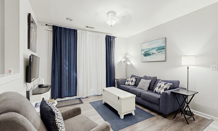 Fully-furnished first-floor condo with pool & private washer/dryer- dog-friendly