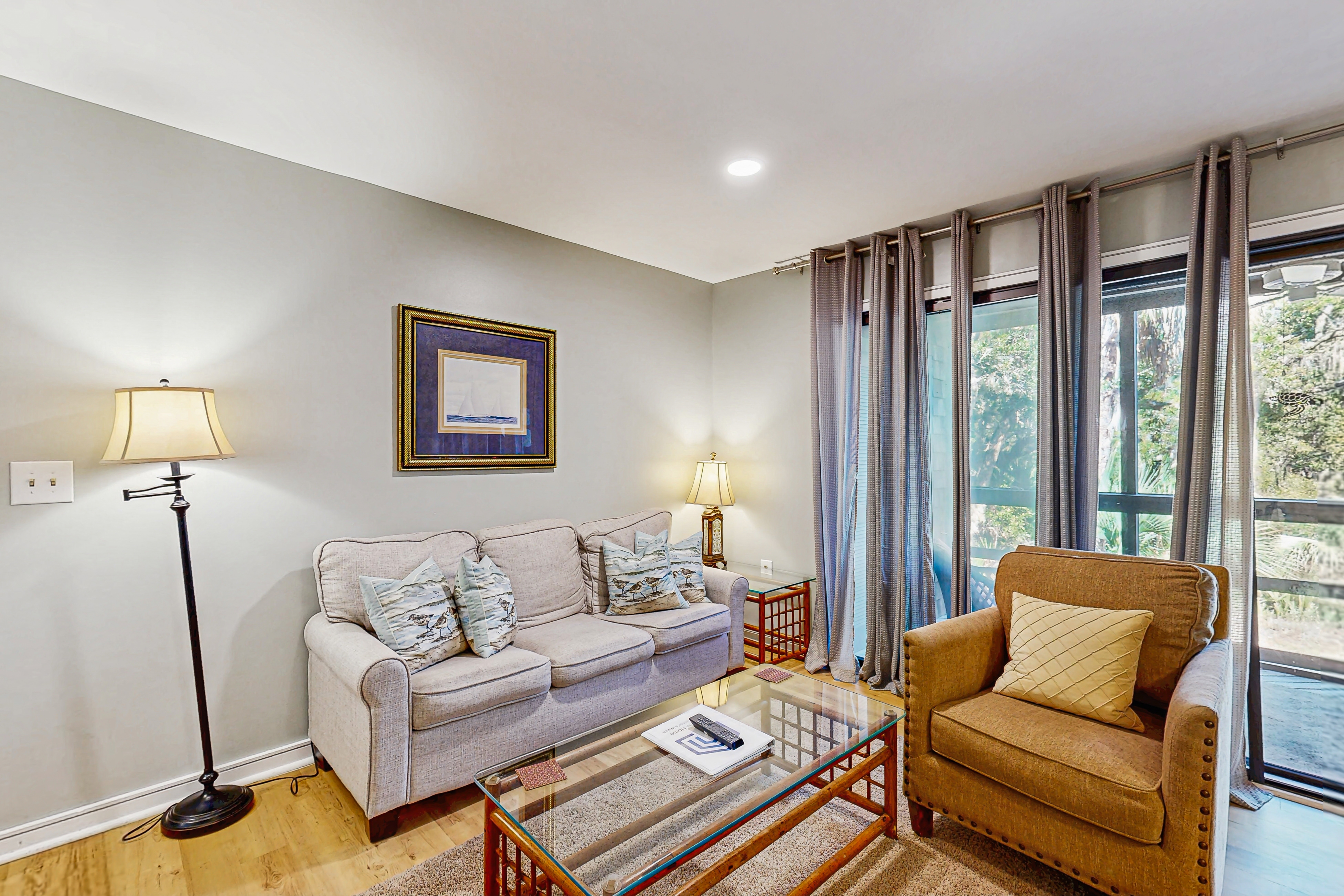 Renovated lagoon-view condo with screened porch & WiFi - steps from the beach