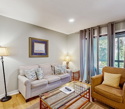 Renovated lagoon-view condo with screened porch & WiFi - steps from the beach