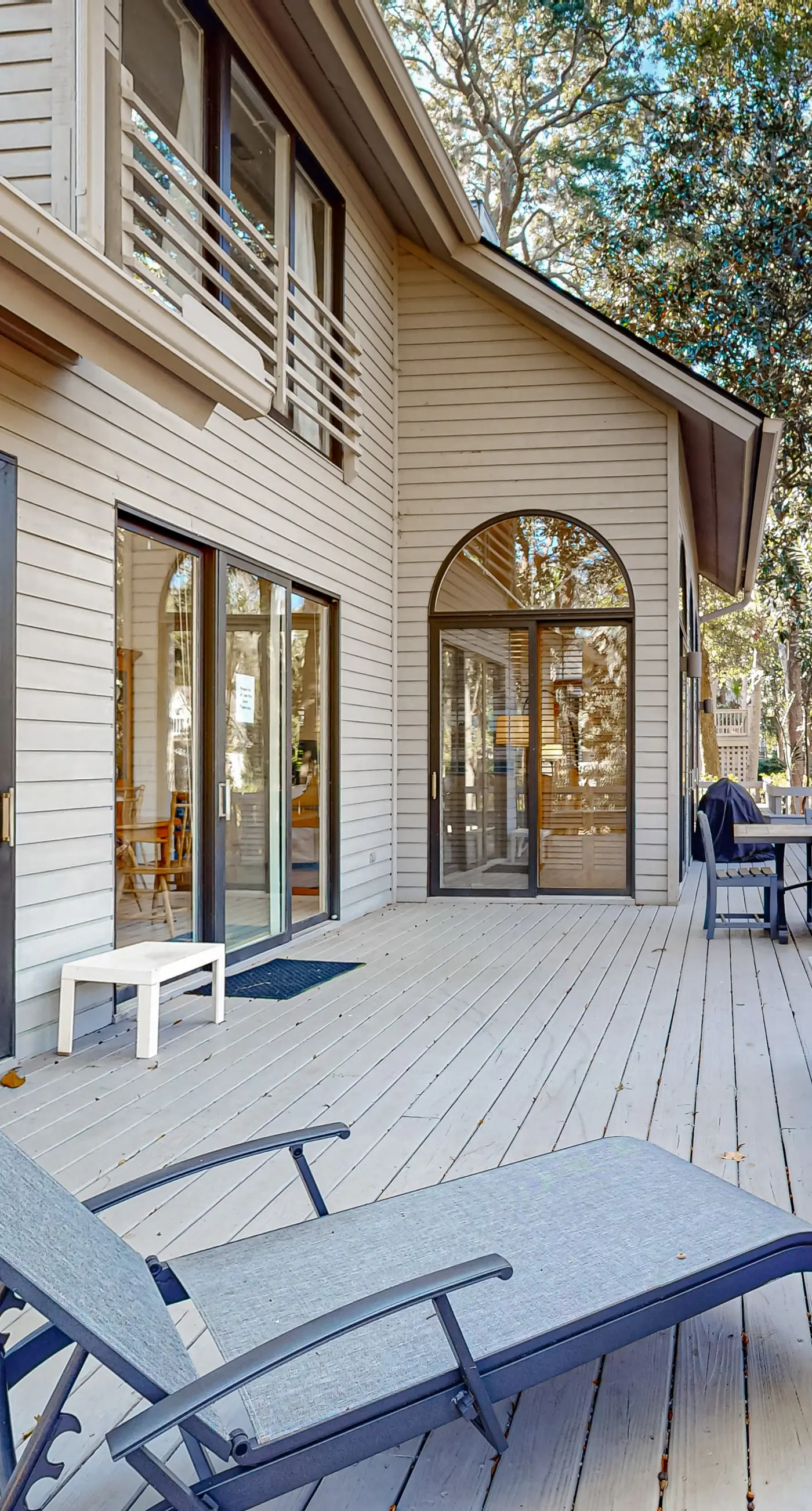 Private home with large deck and views of a lagoon – walk or bike to the beach