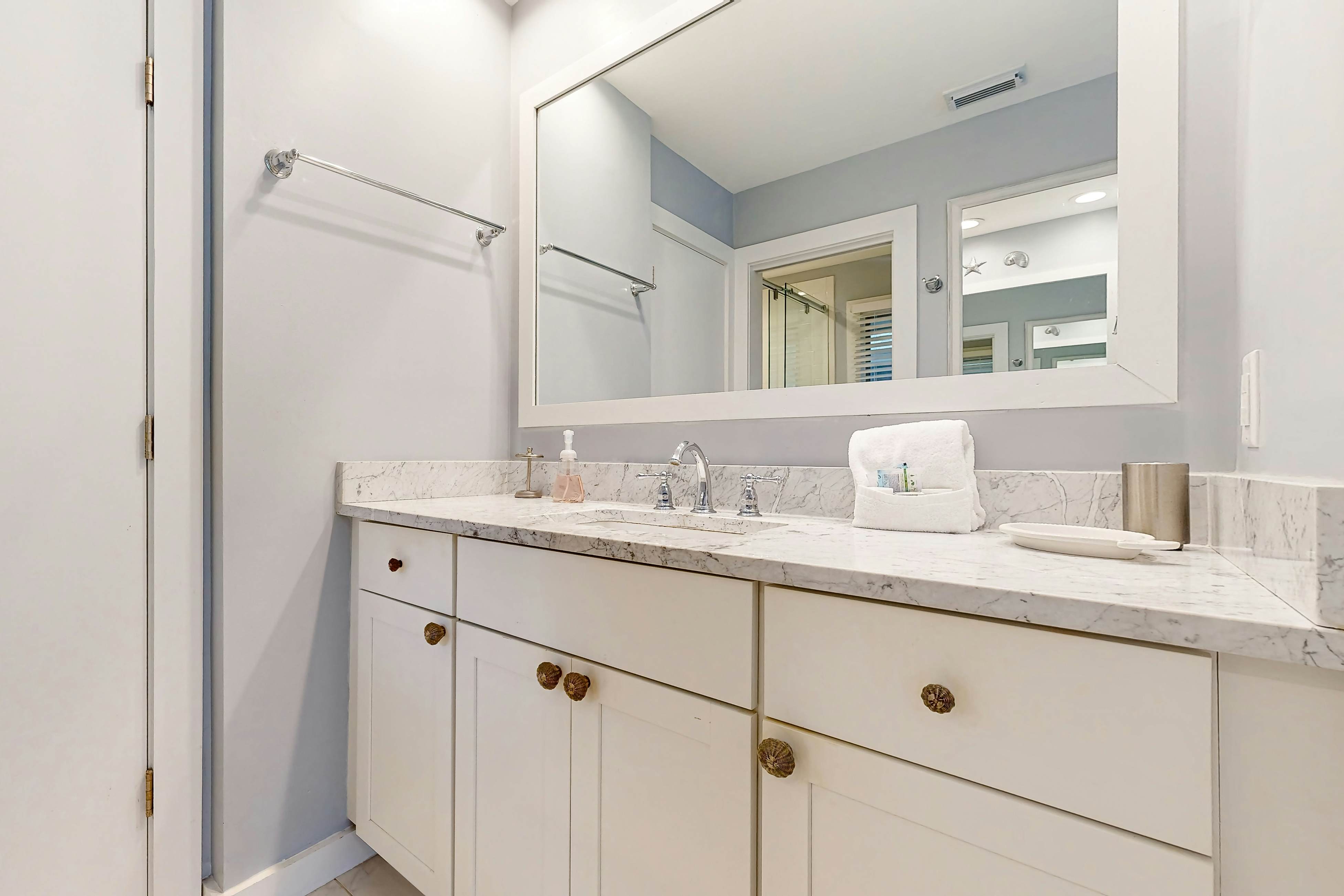 Dog-friendly home with deck, grill & pool - easy walk to beach, dining & shops