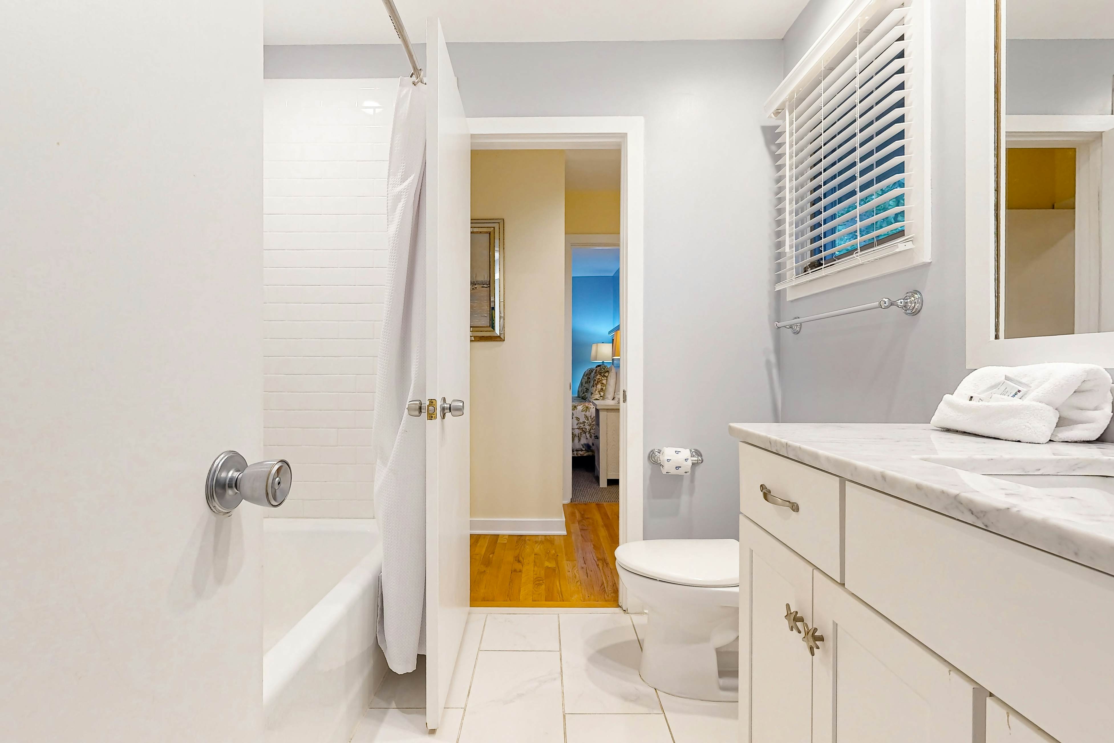 Dog-friendly home with deck, grill & pool - easy walk to beach, dining & shops