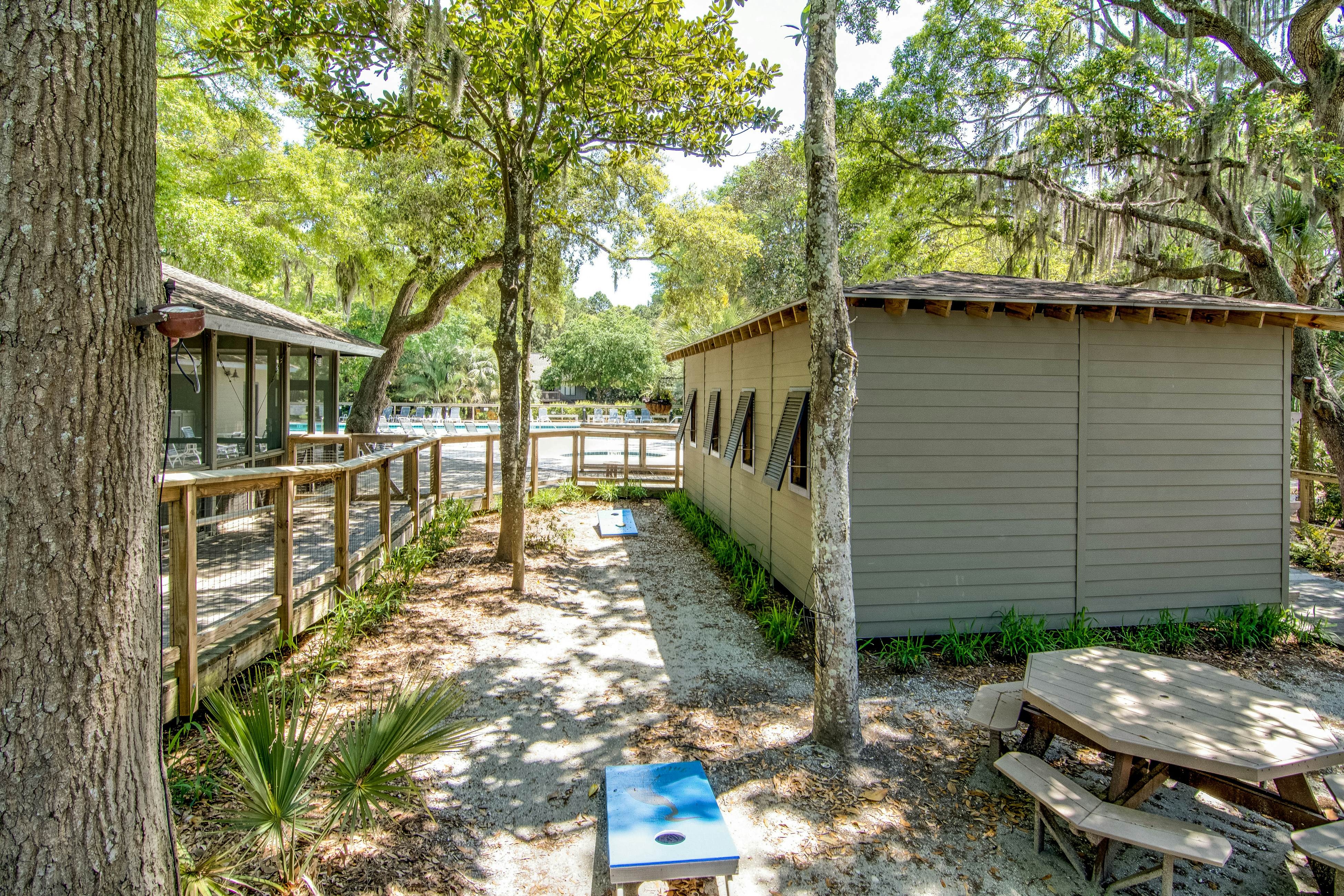 Dog-friendly home with deck, grill & pool - easy walk to beach, dining & shops