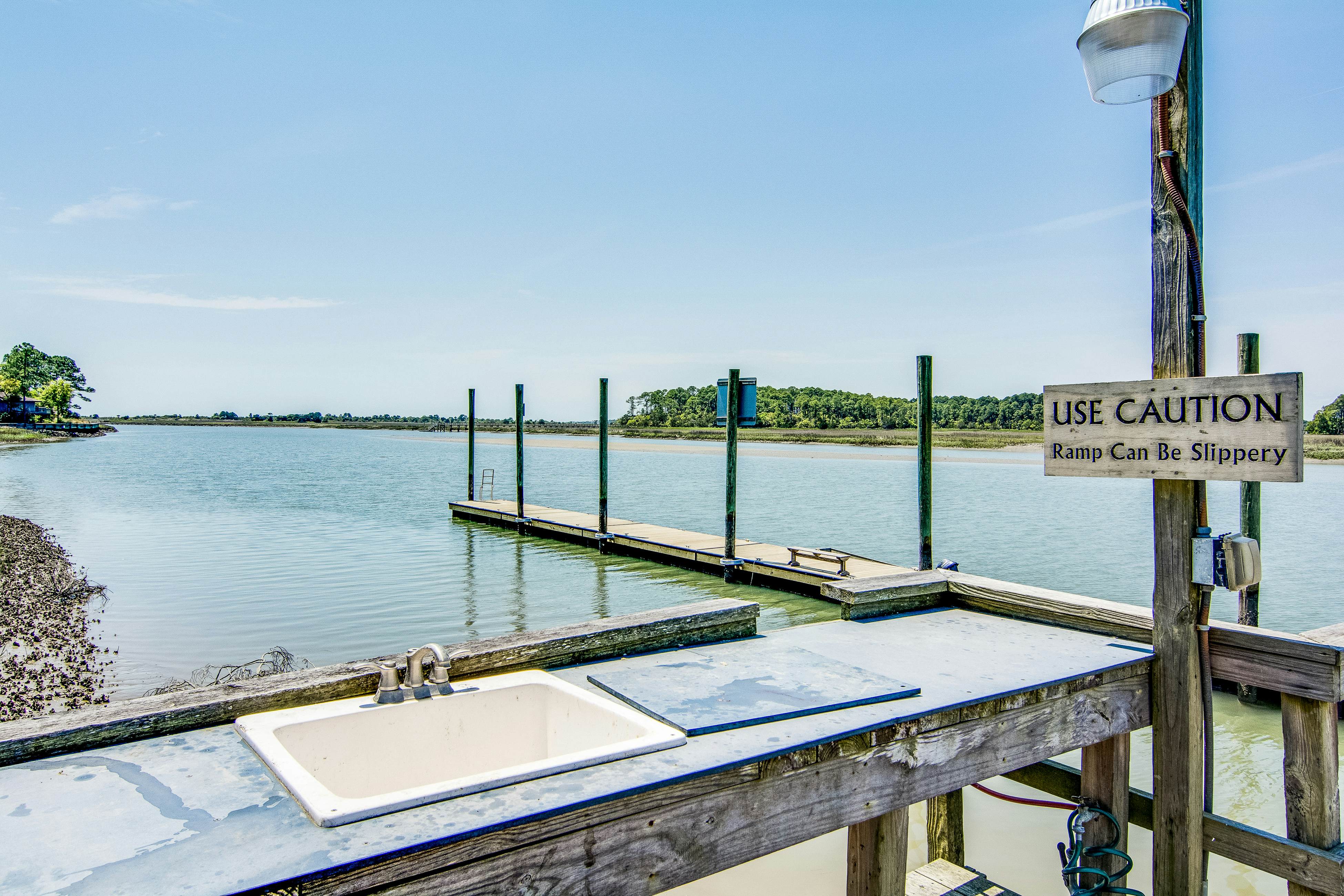 Dog-friendly home with deck, grill & pool - easy walk to beach, dining & shops