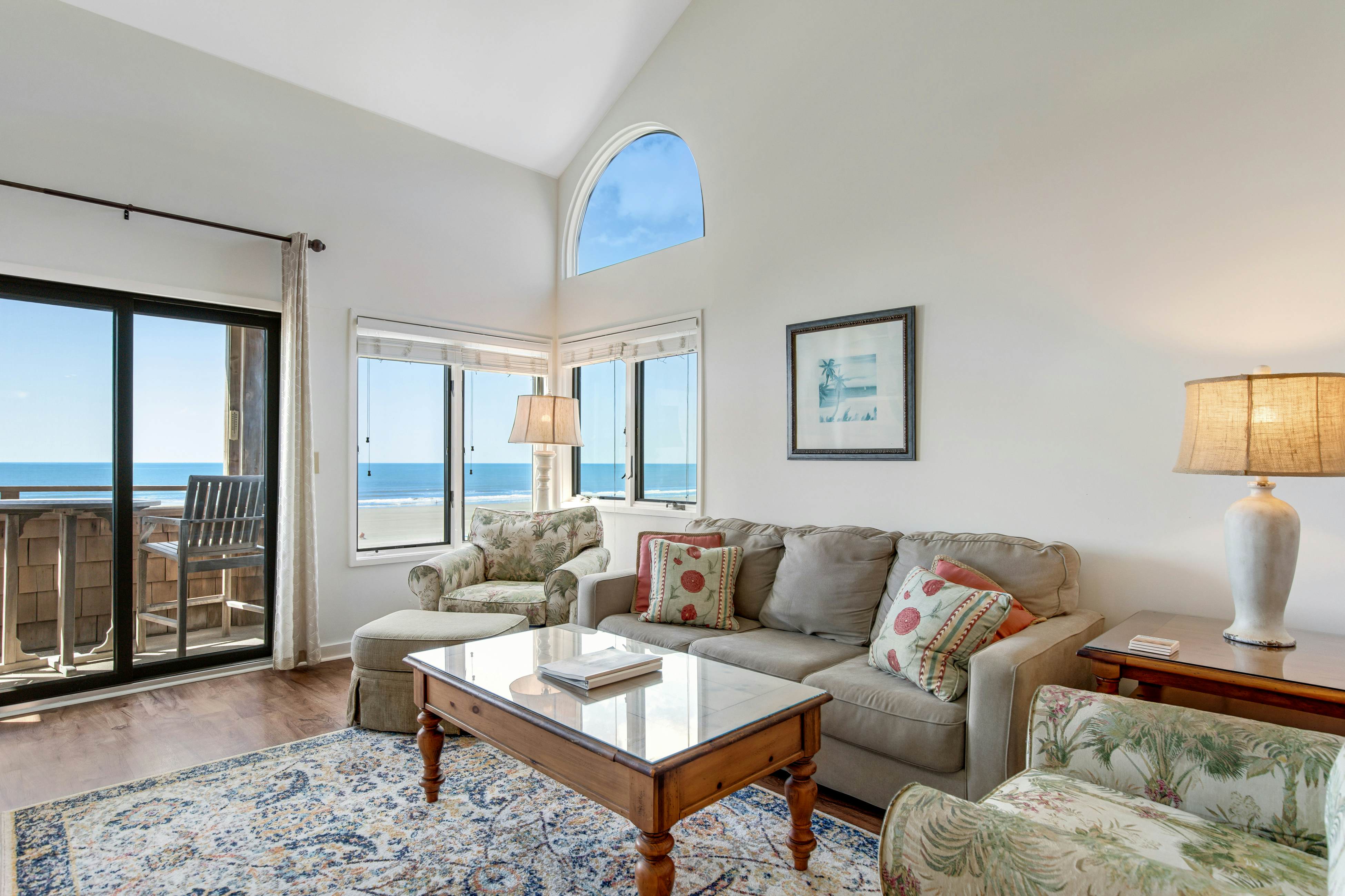 Second floor oceanfront villa with deck & full kitchen super close to the beach