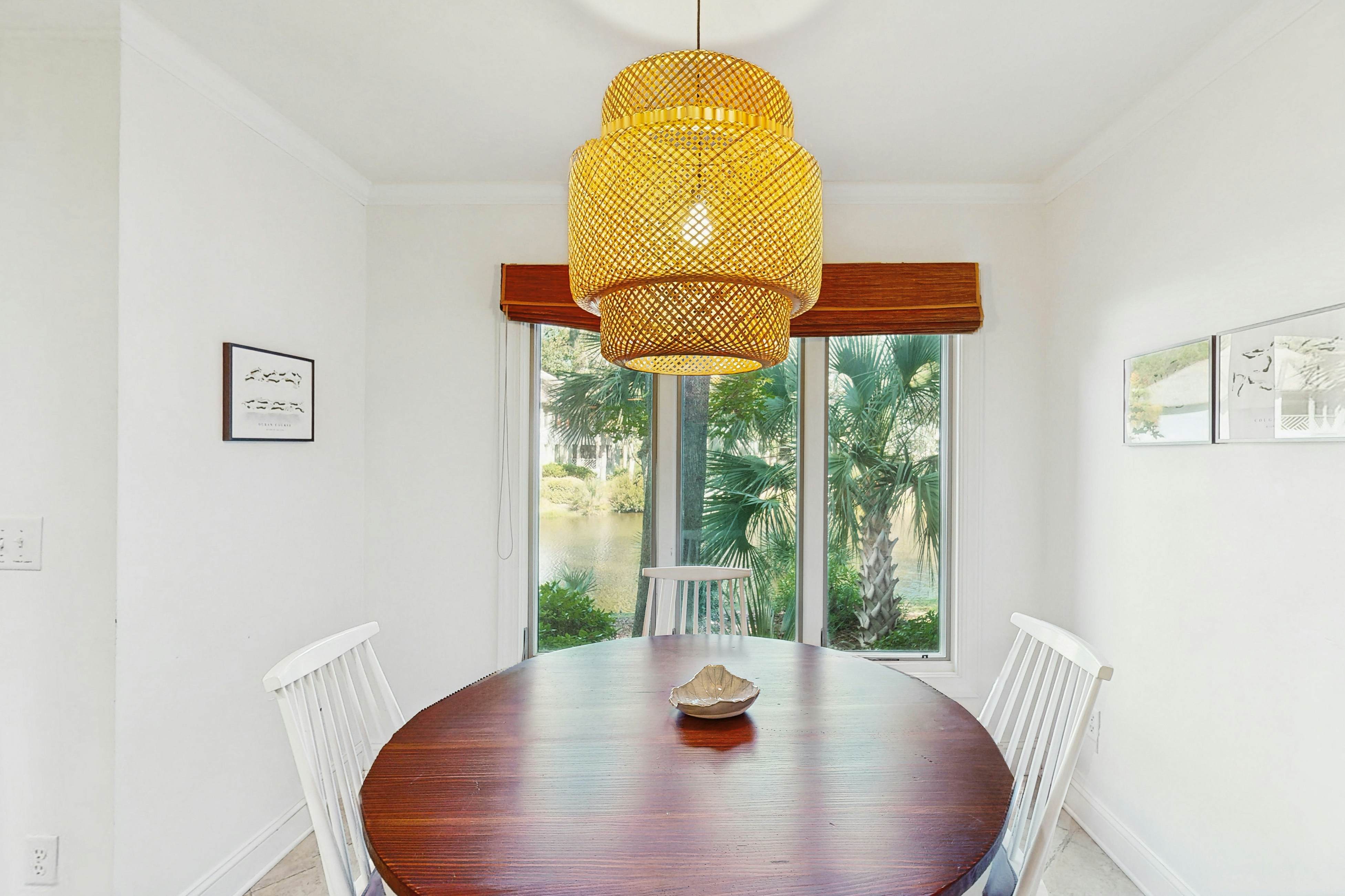 Lagoon-Front Villa w/ Screened Porch, WiFi & AC - Steps to Beach, Tennis & Golf