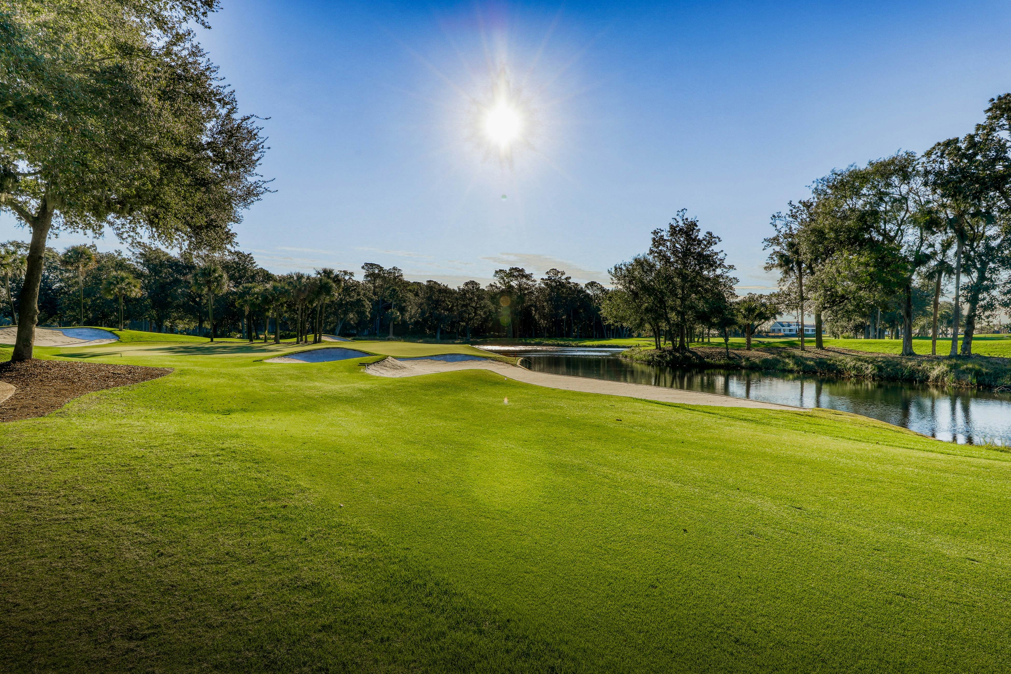 Lagoon-Front Villa w/ Screened Porch, WiFi & AC - Steps to Beach, Tennis & Golf