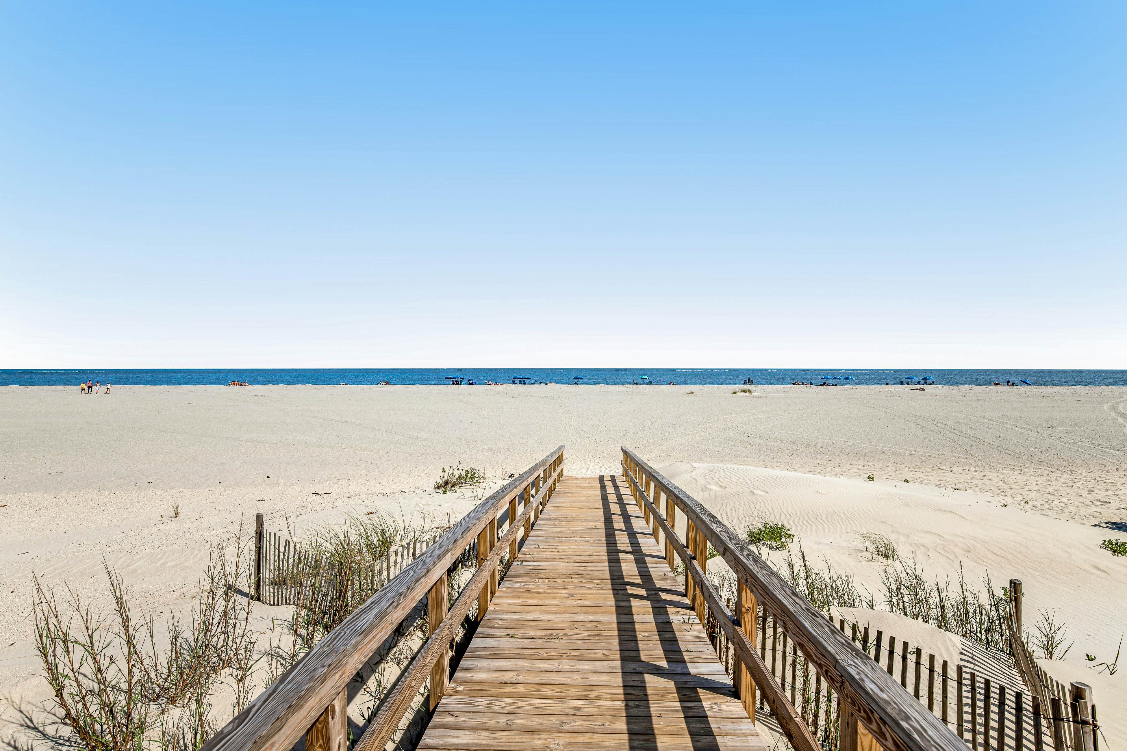 Oceanfront condo on the beach with shared pool, hot tub, & gorgeous decor