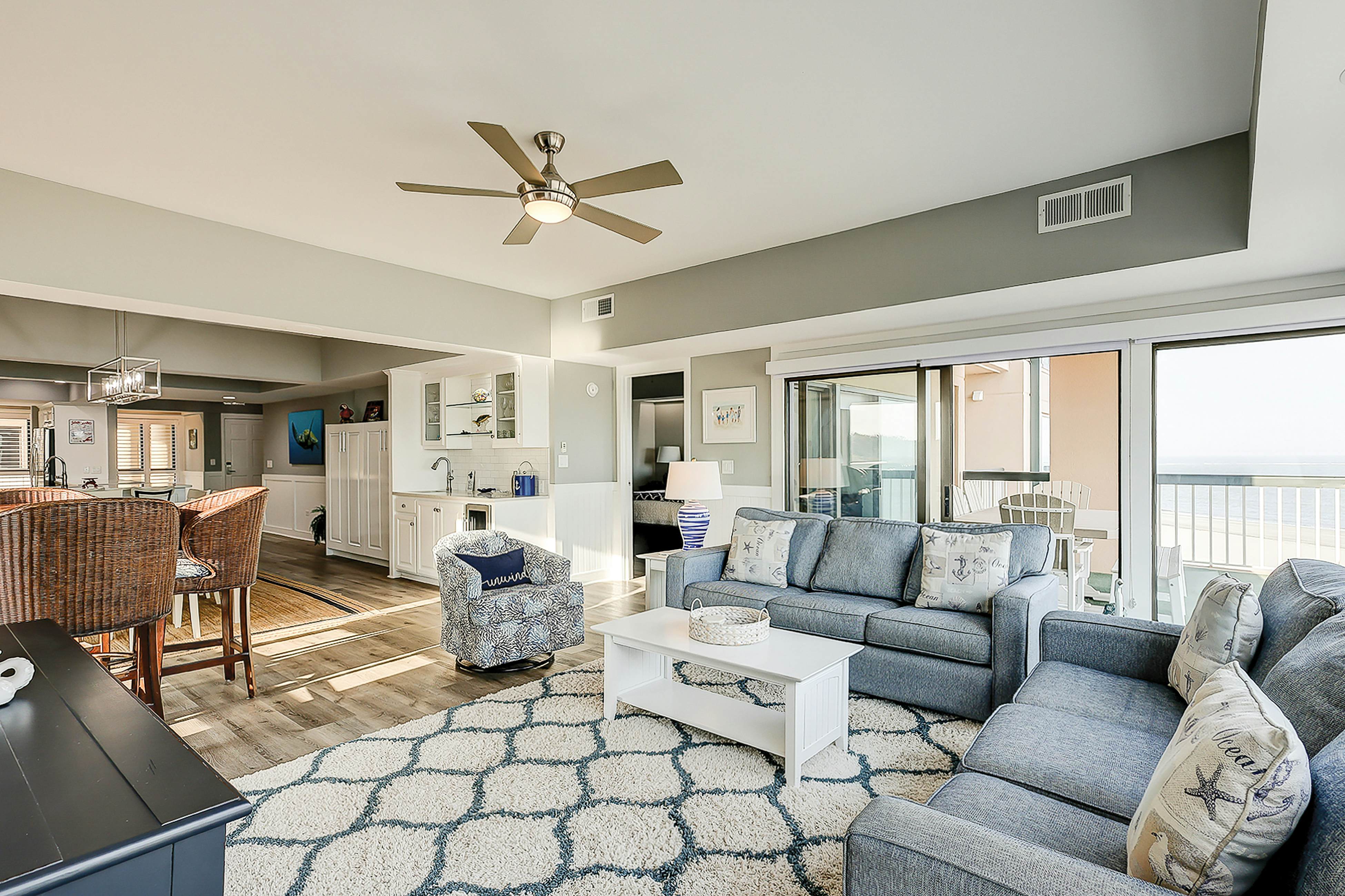 Oceanfront condo on the beach with shared pool, hot tub, & gorgeous decor