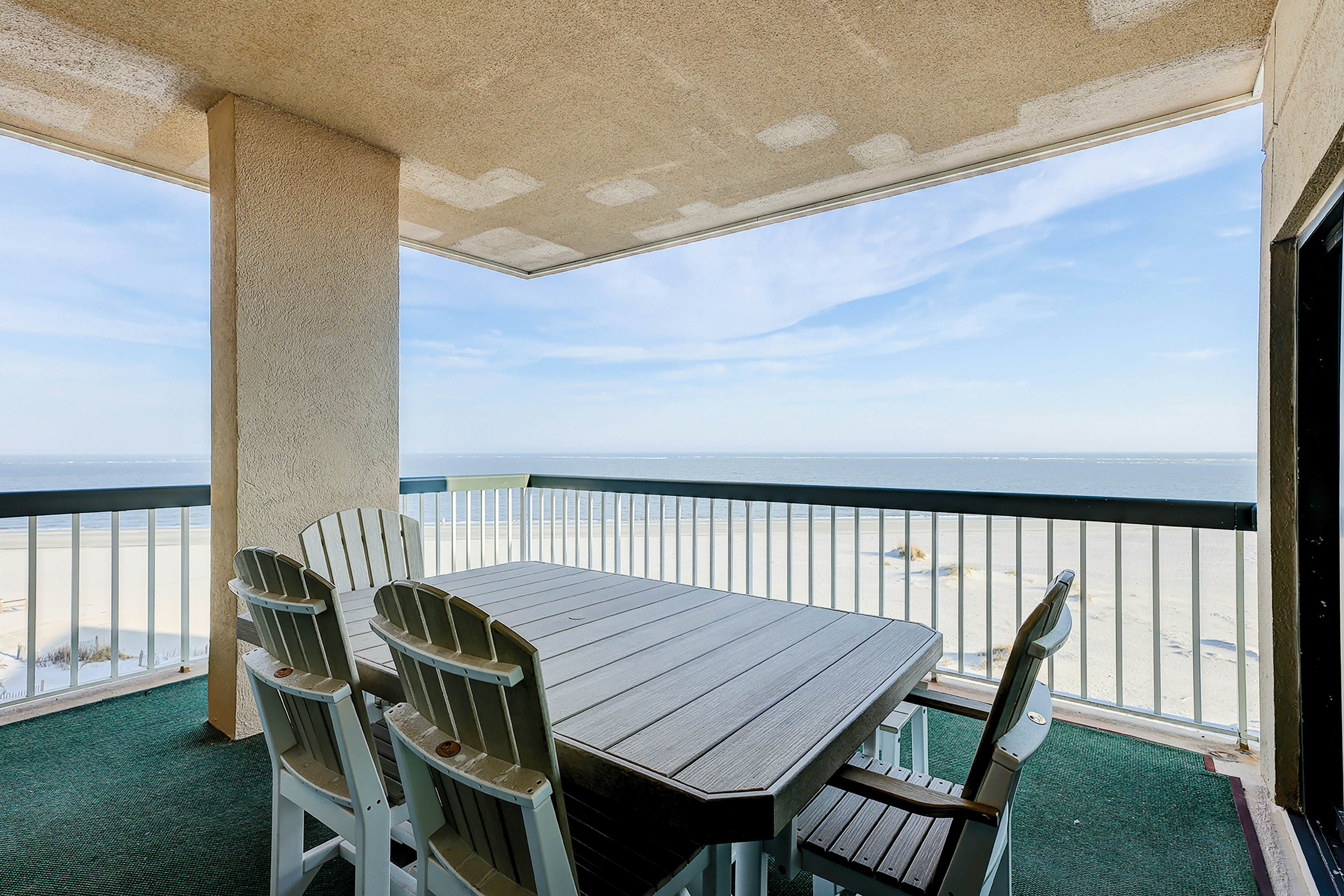 Oceanfront condo on the beach with shared pool, hot tub, & gorgeous decor