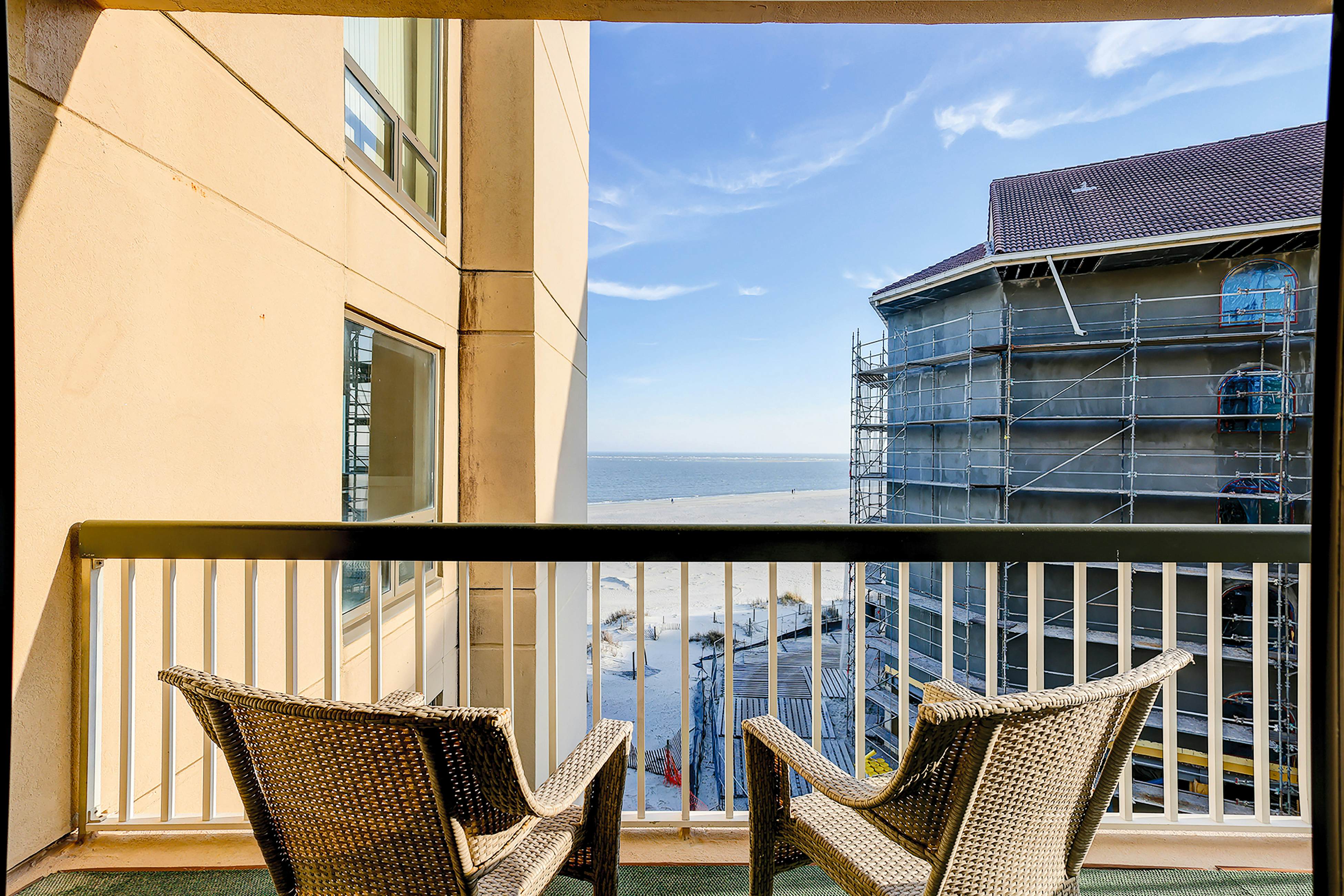 Oceanfront condo on the beach with shared pool, hot tub, & gorgeous decor