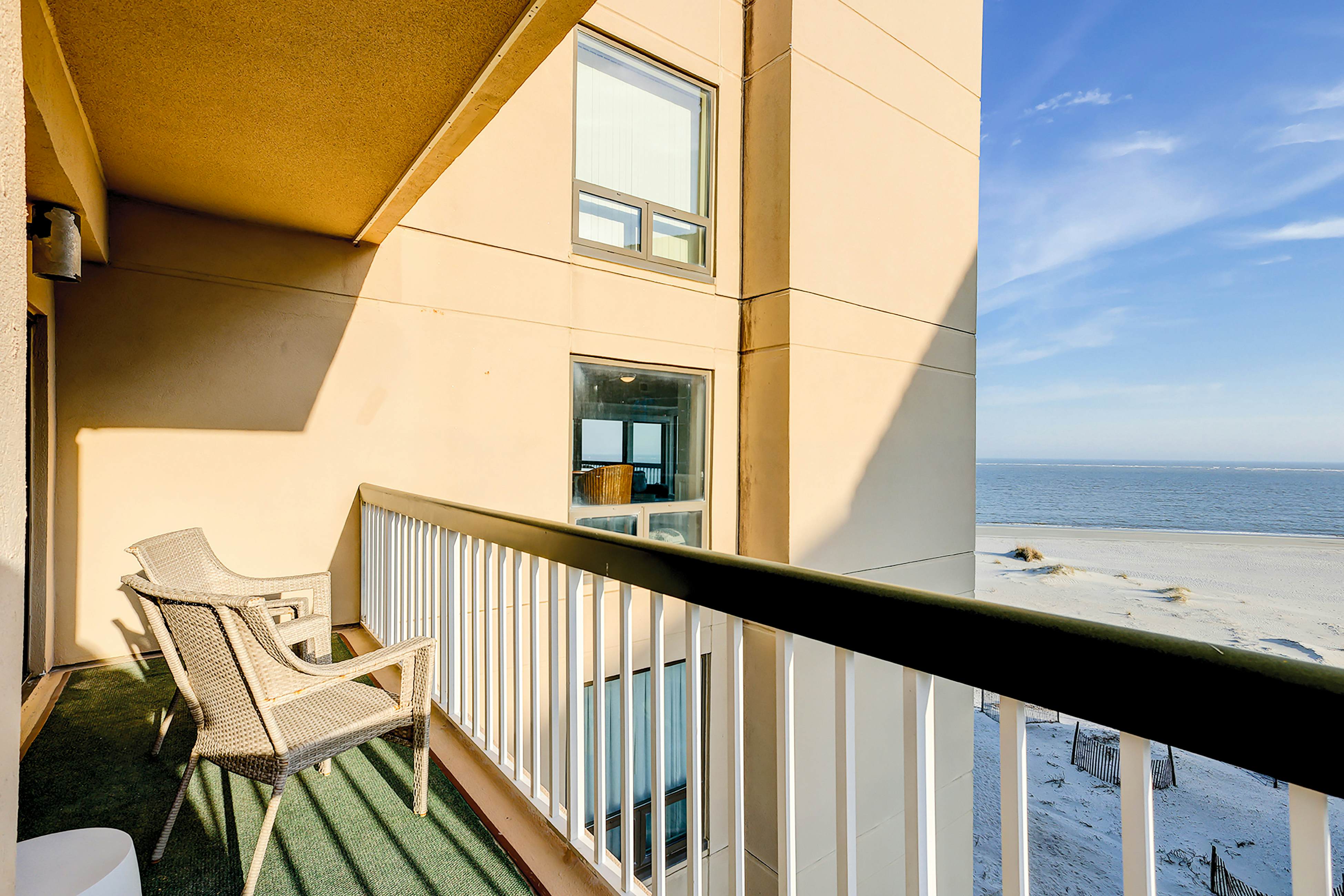 Oceanfront condo on the beach with shared pool, hot tub, & gorgeous decor