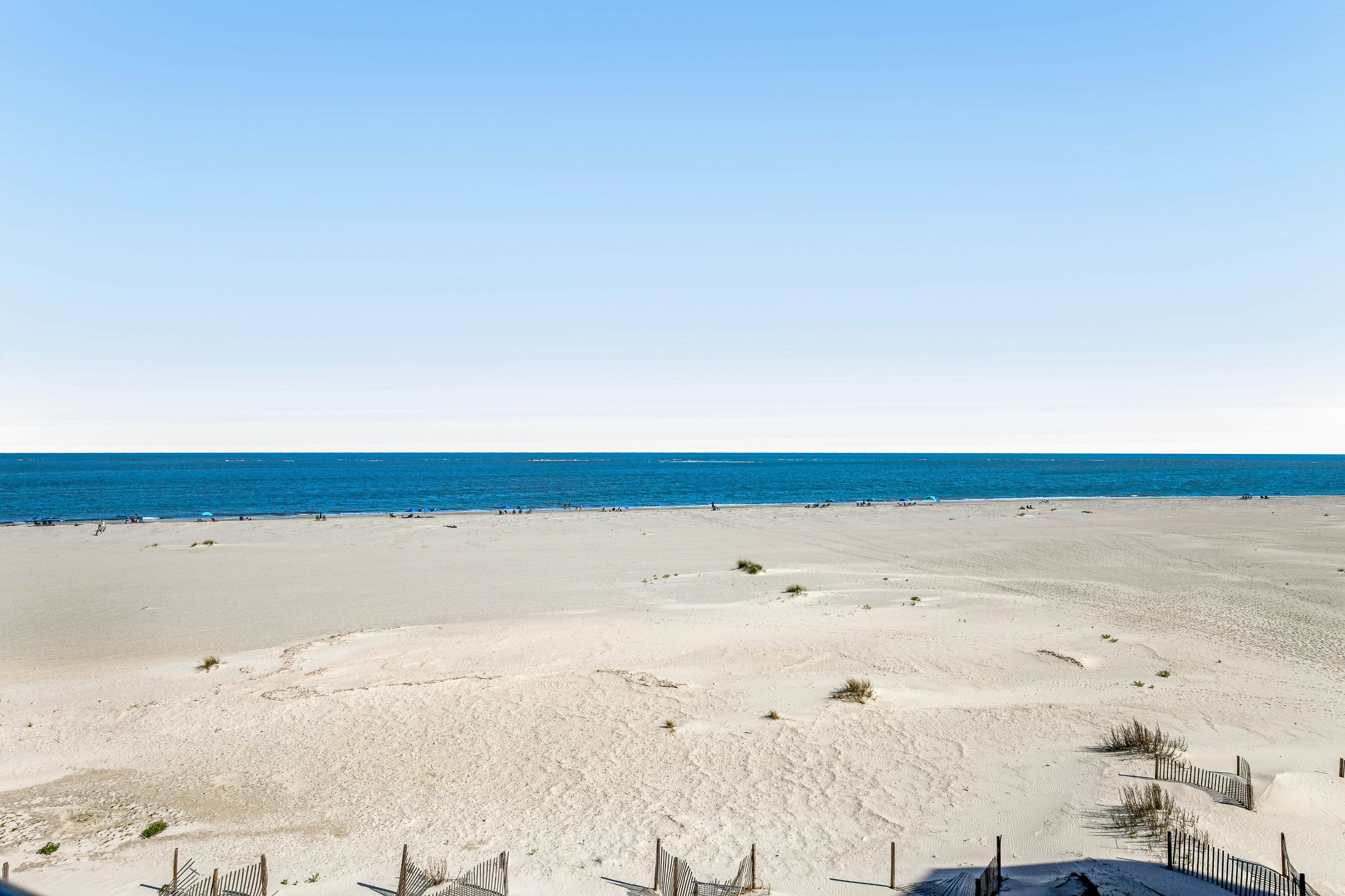 Oceanfront condo on the beach with shared pool, hot tub, & gorgeous decor