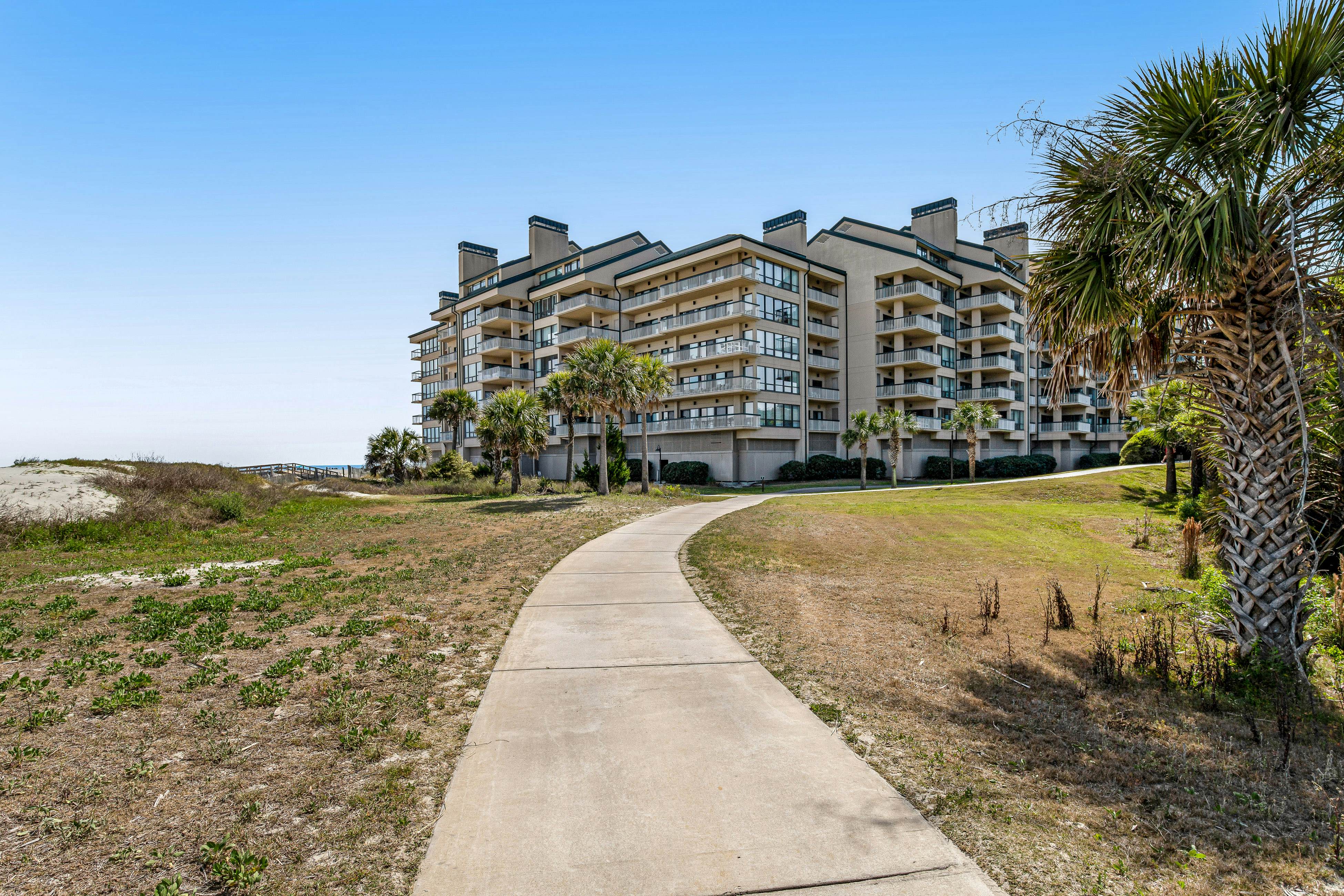 Oceanfront condo on the beach with shared pool, hot tub, & gorgeous decor