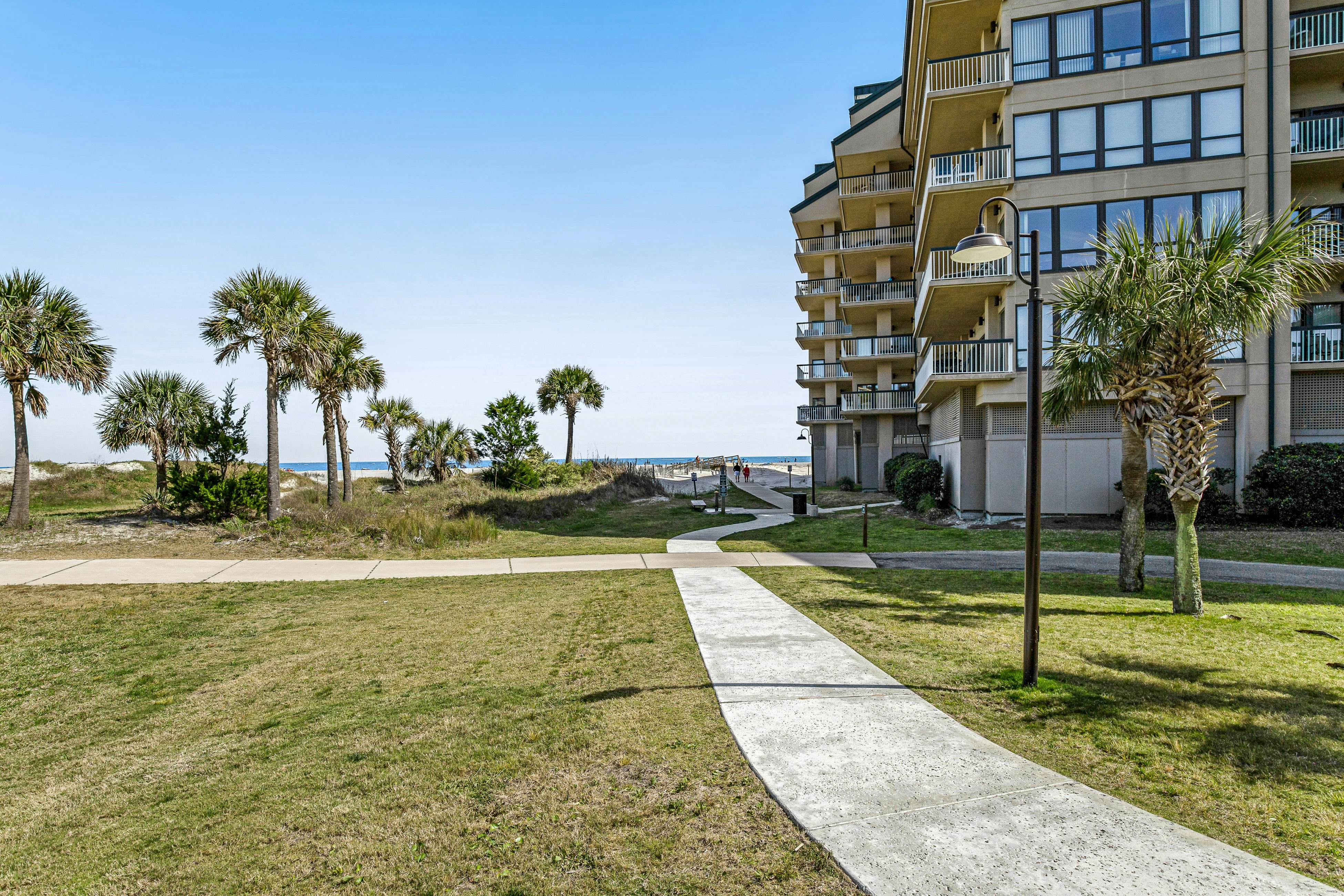 Oceanfront condo on the beach with shared pool, hot tub, & gorgeous decor