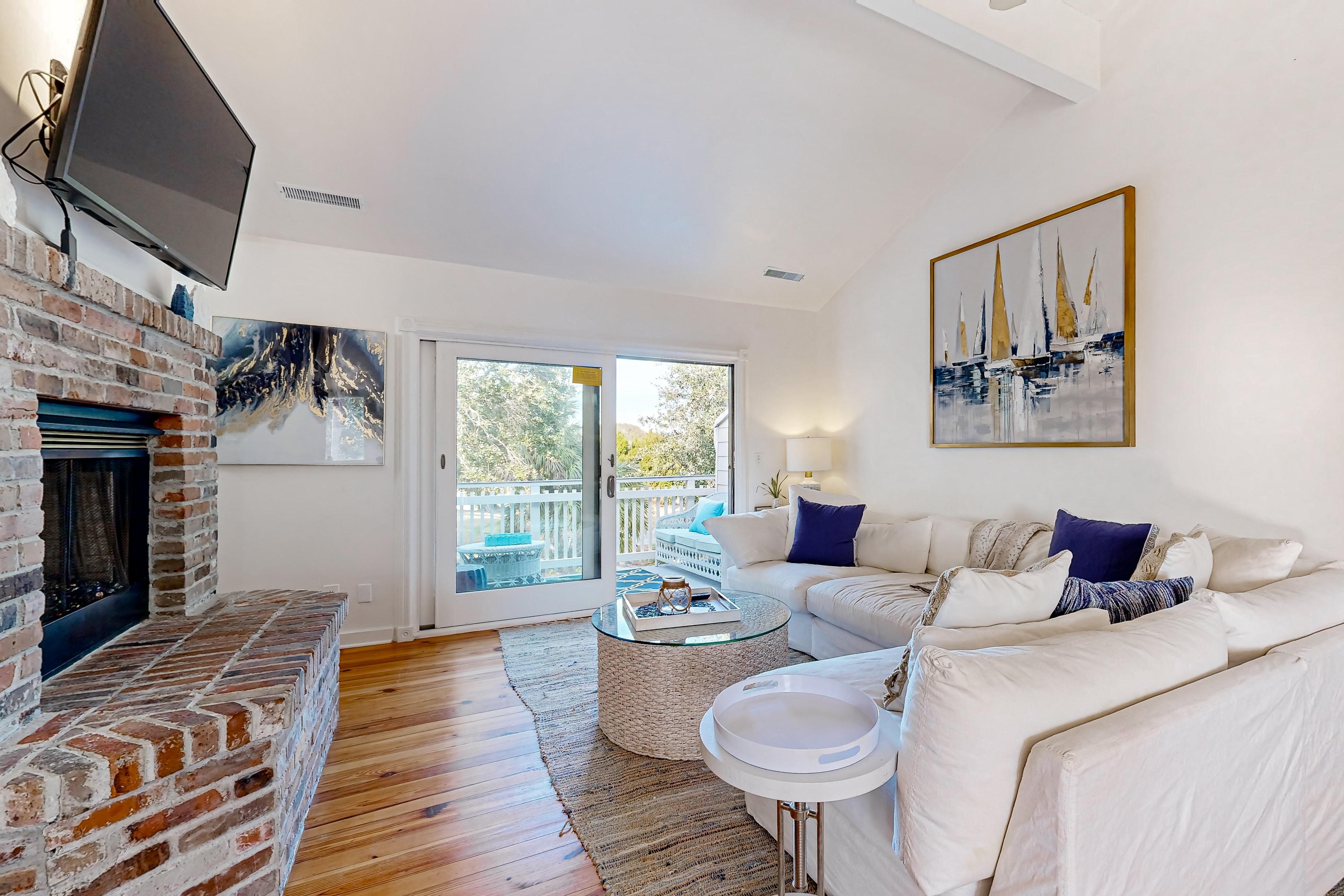 Updated townhouse with outside deck, shared pool, tennis, pickleball and beach