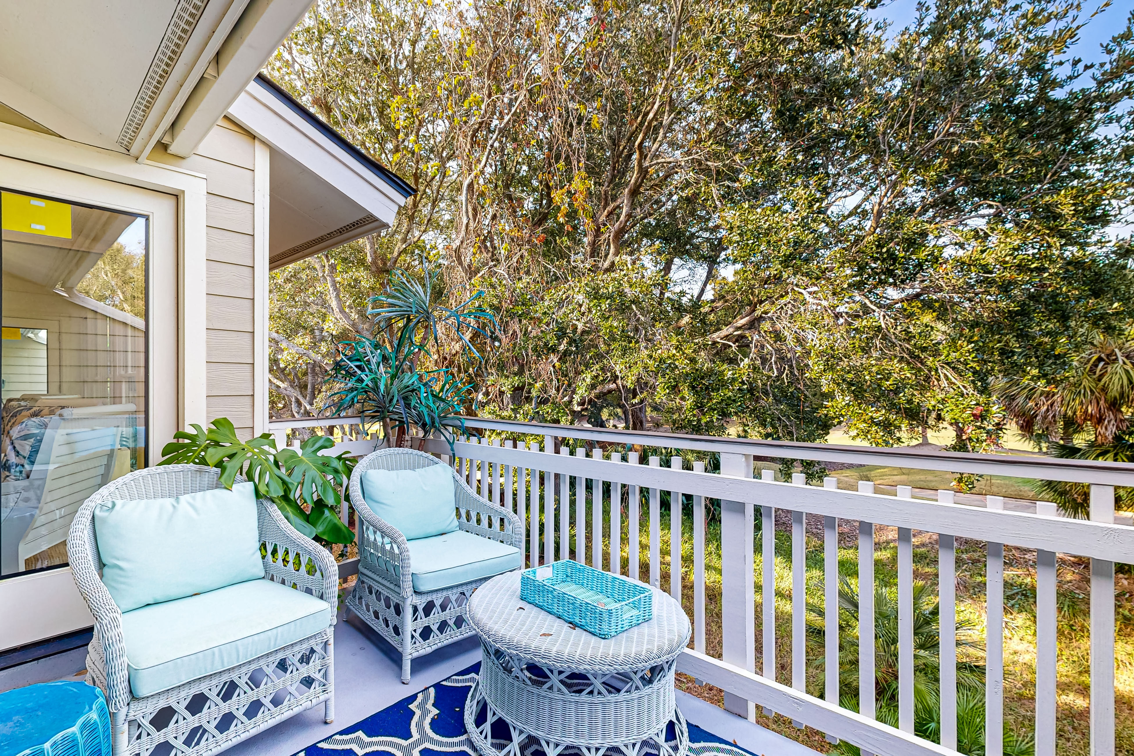 Updated townhouse with outside deck, shared pool, tennis, pickleball and beach