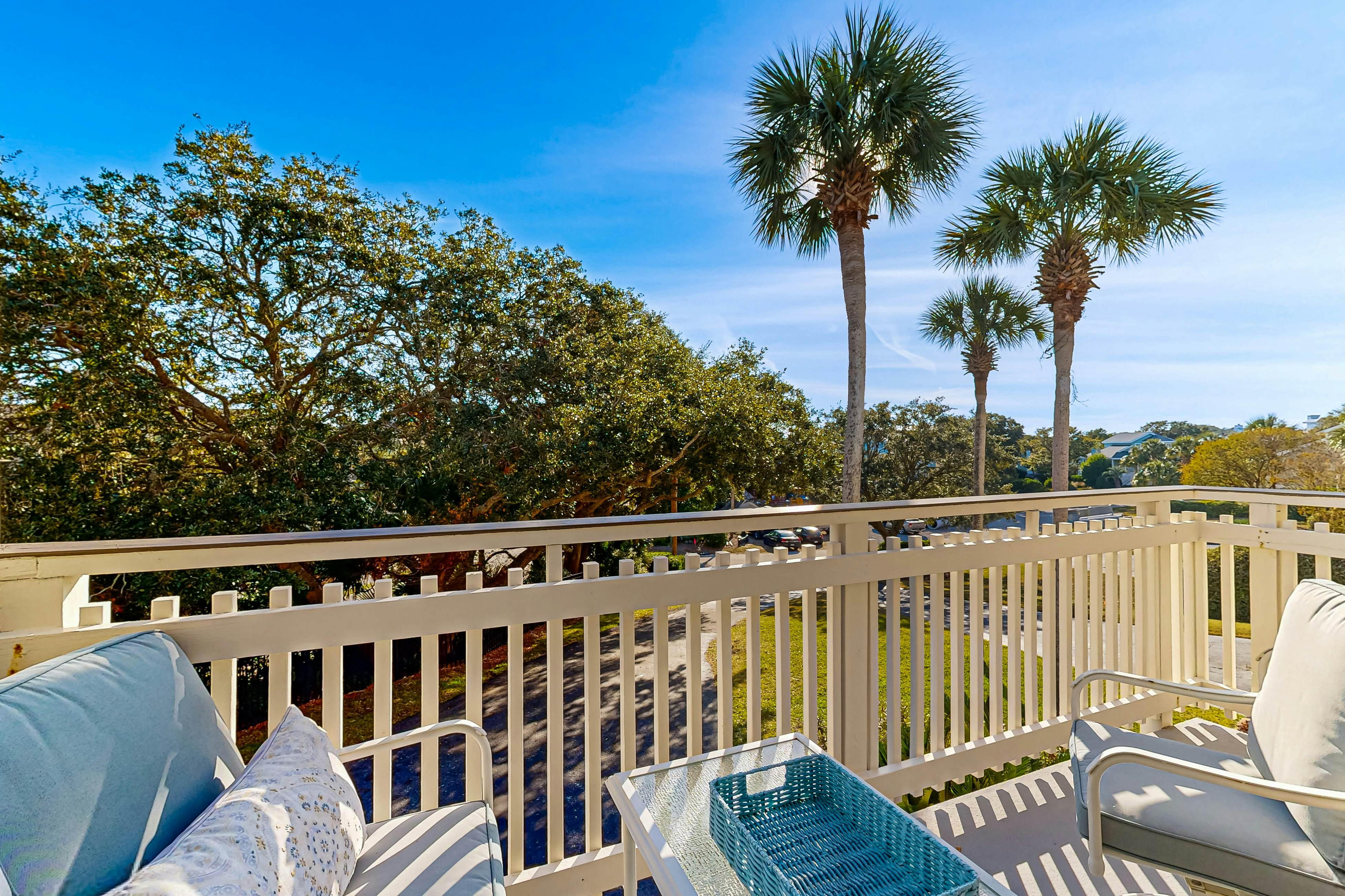 Updated townhouse with outside deck, shared pool, tennis, pickleball and beach