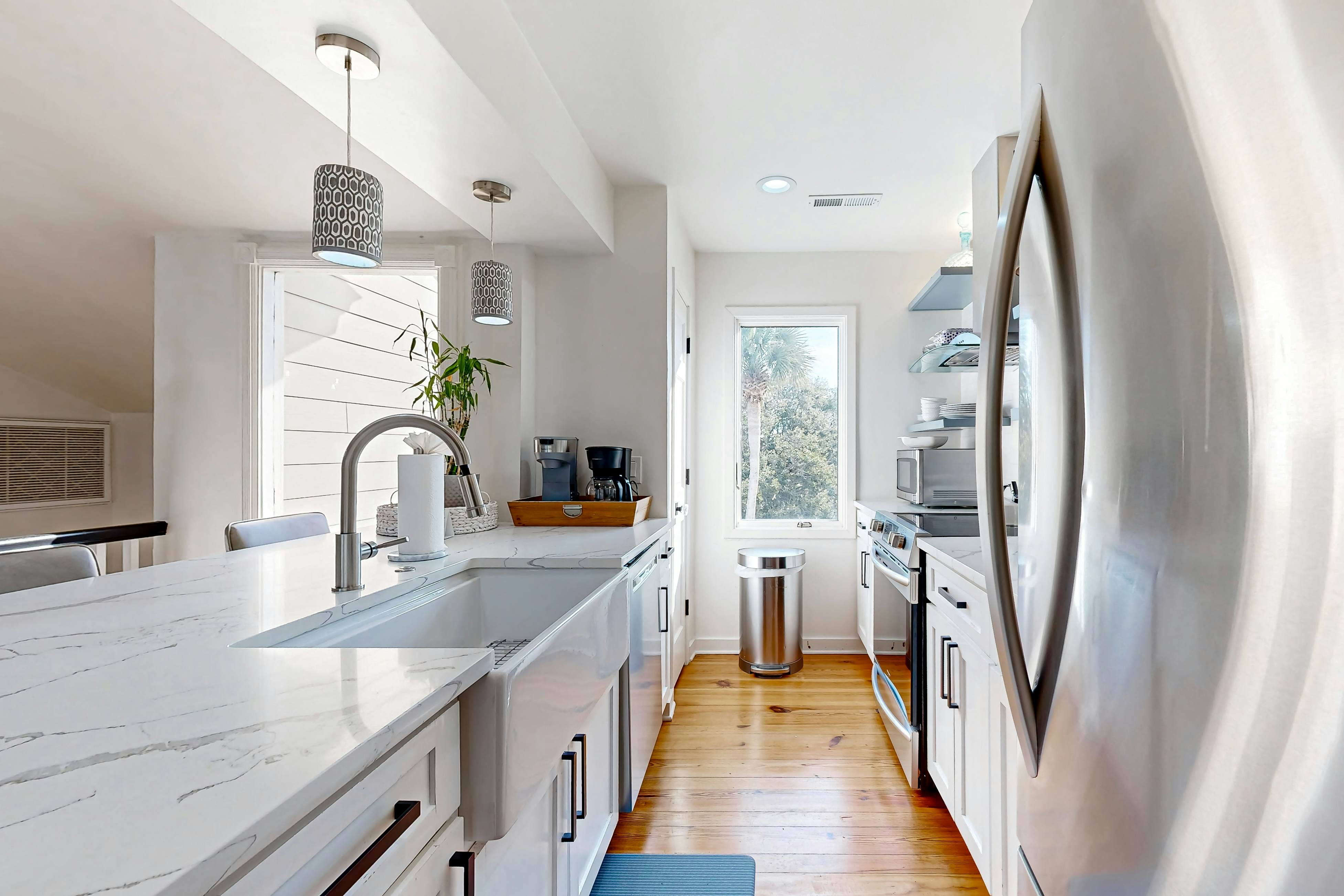 Updated townhouse with outside deck, shared pool, tennis, pickleball and beach