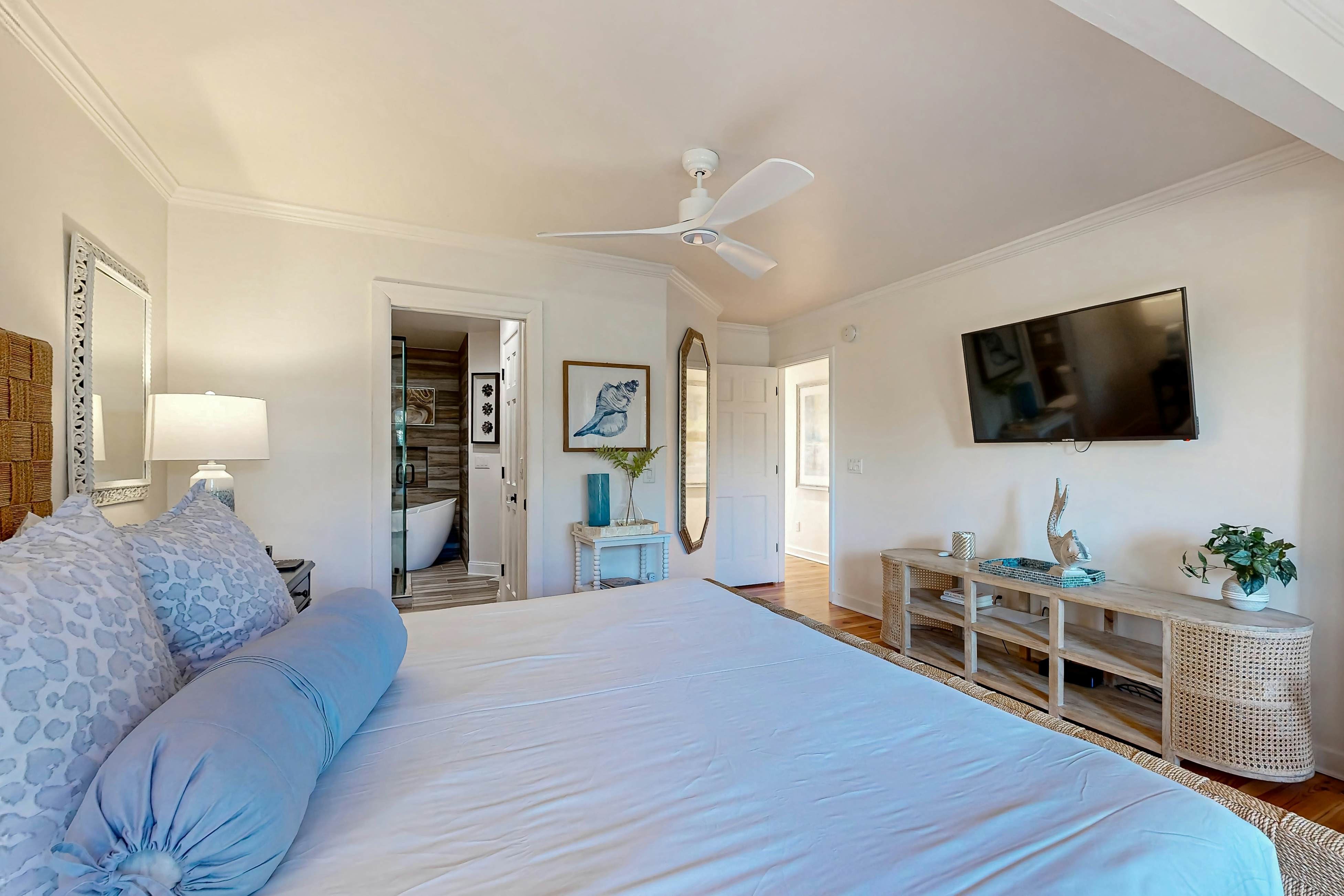 Updated townhouse with outside deck, shared pool, tennis, pickleball and beach