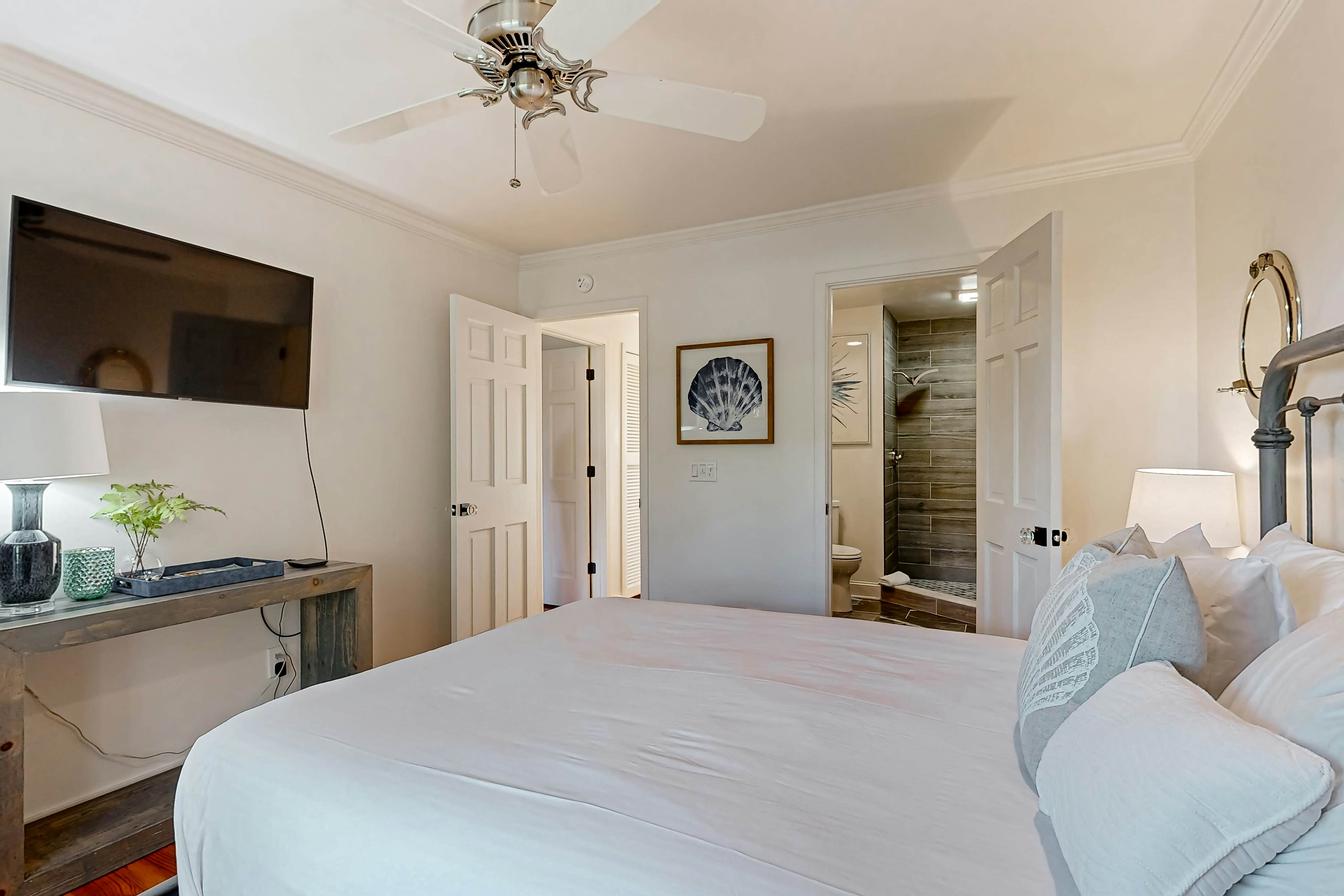 Updated townhouse with outside deck, shared pool, tennis, pickleball and beach