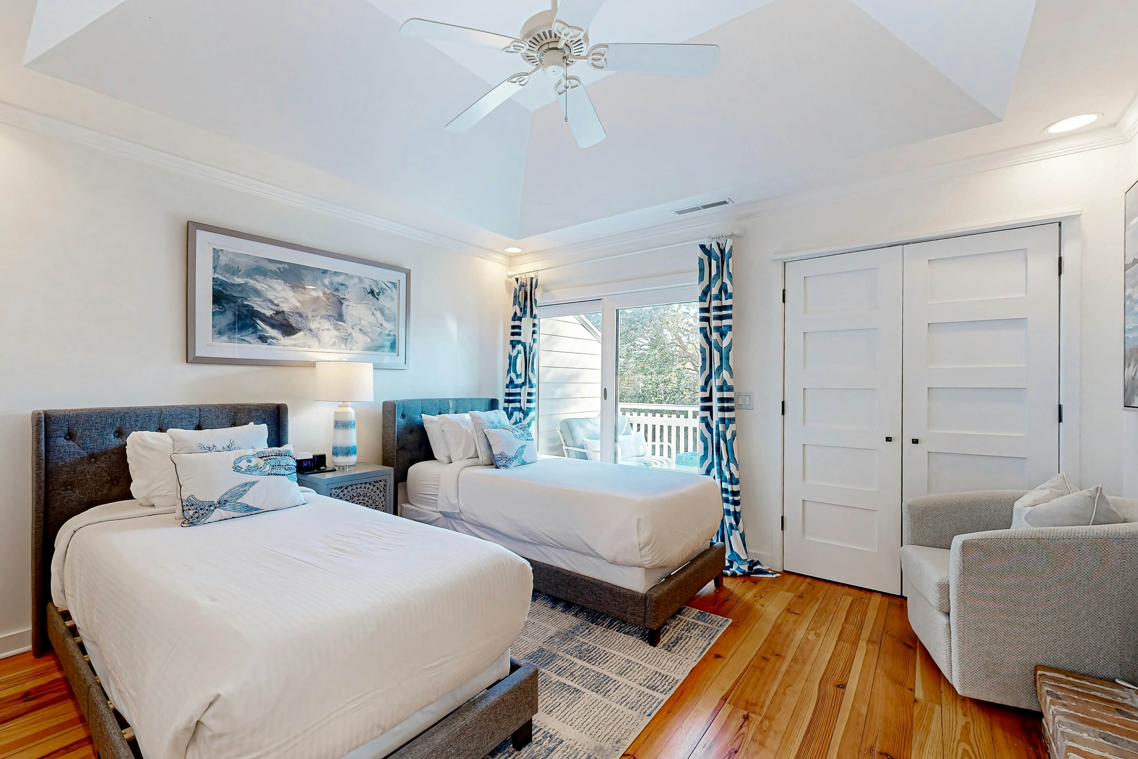 Updated townhouse with outside deck, shared pool, tennis, pickleball and beach