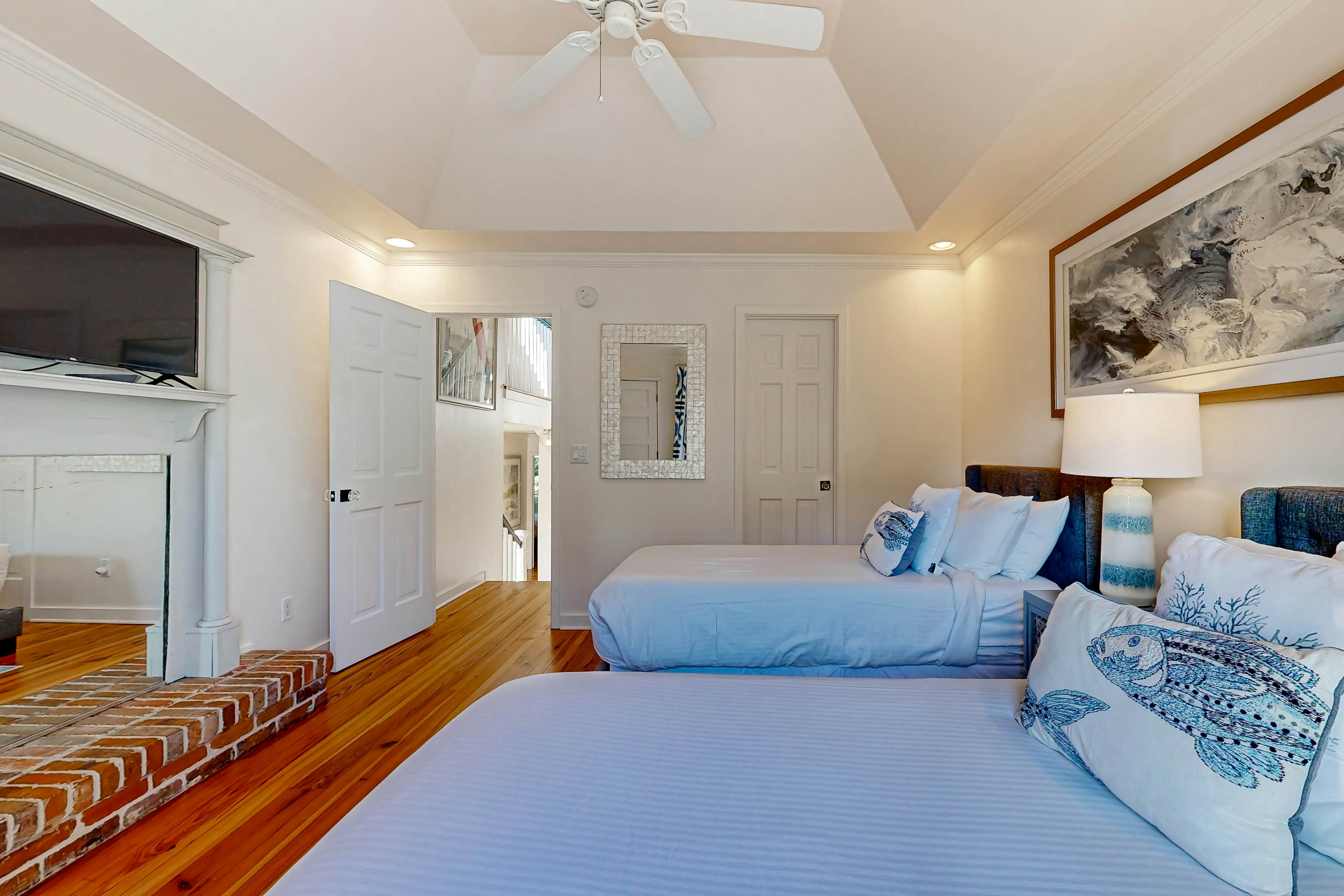 Updated townhouse with outside deck, shared pool, tennis, pickleball and beach