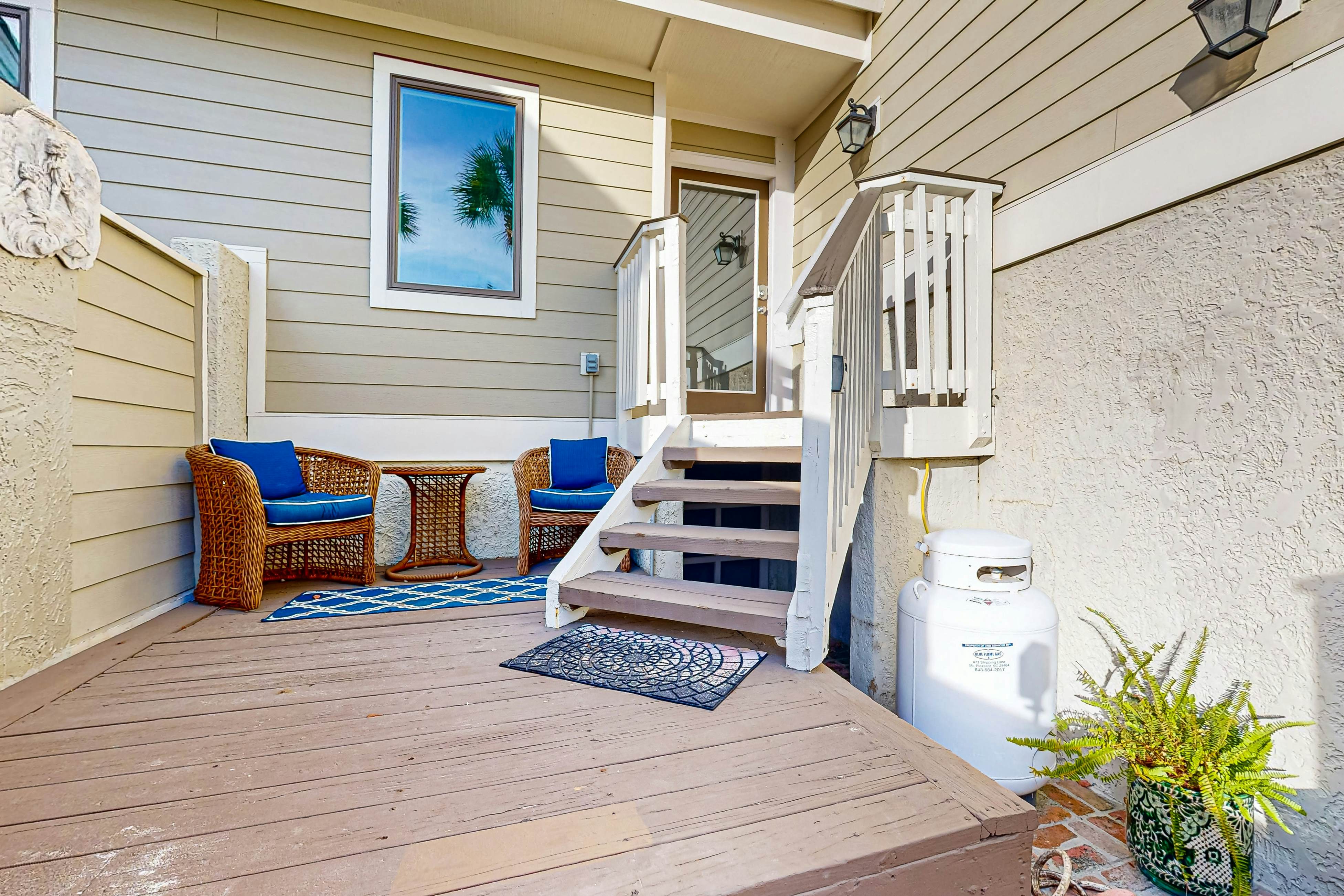 Updated townhouse with outside deck, shared pool, tennis, pickleball and beach