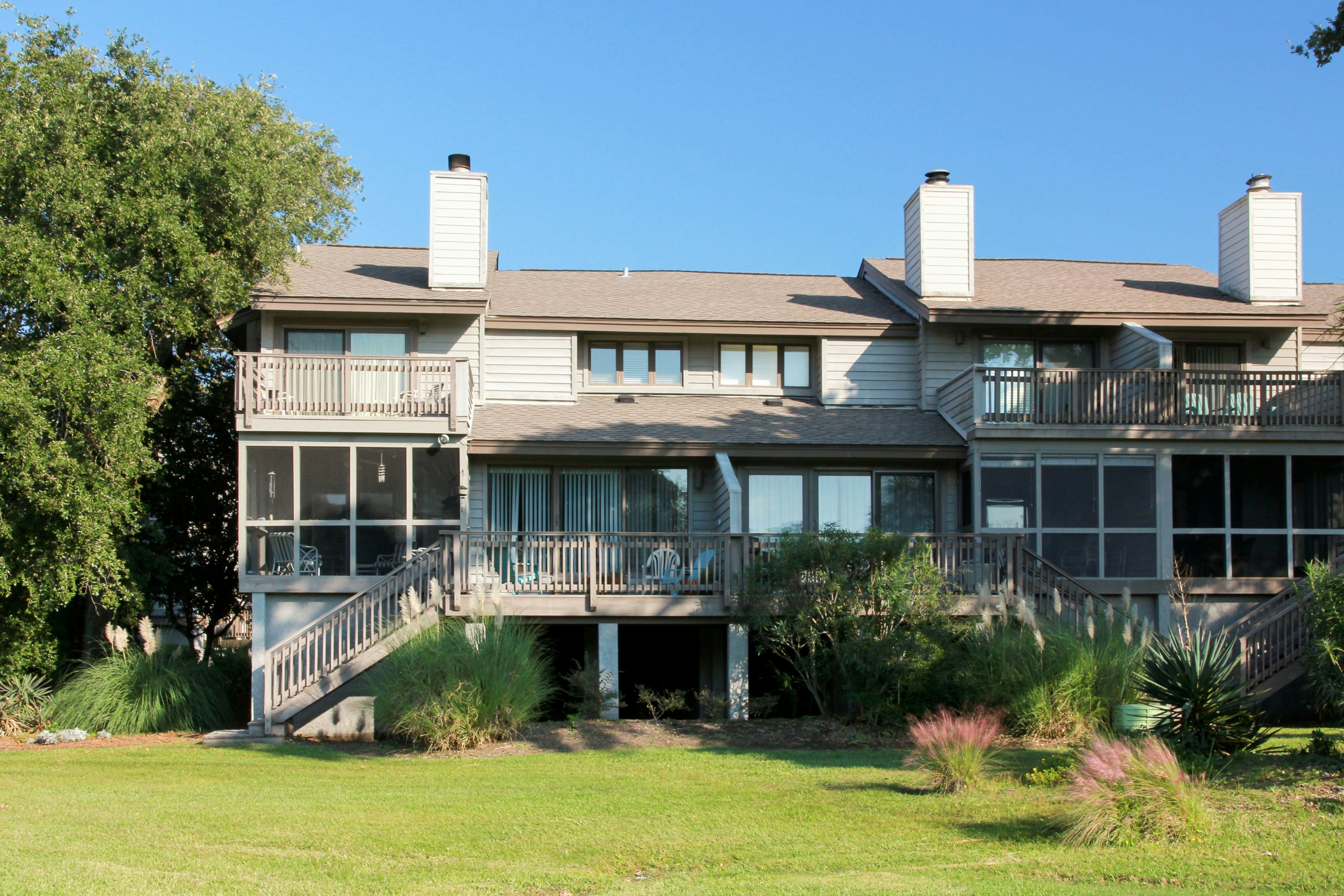 Updated townhouse with outside deck, shared pool, tennis, pickleball and beach