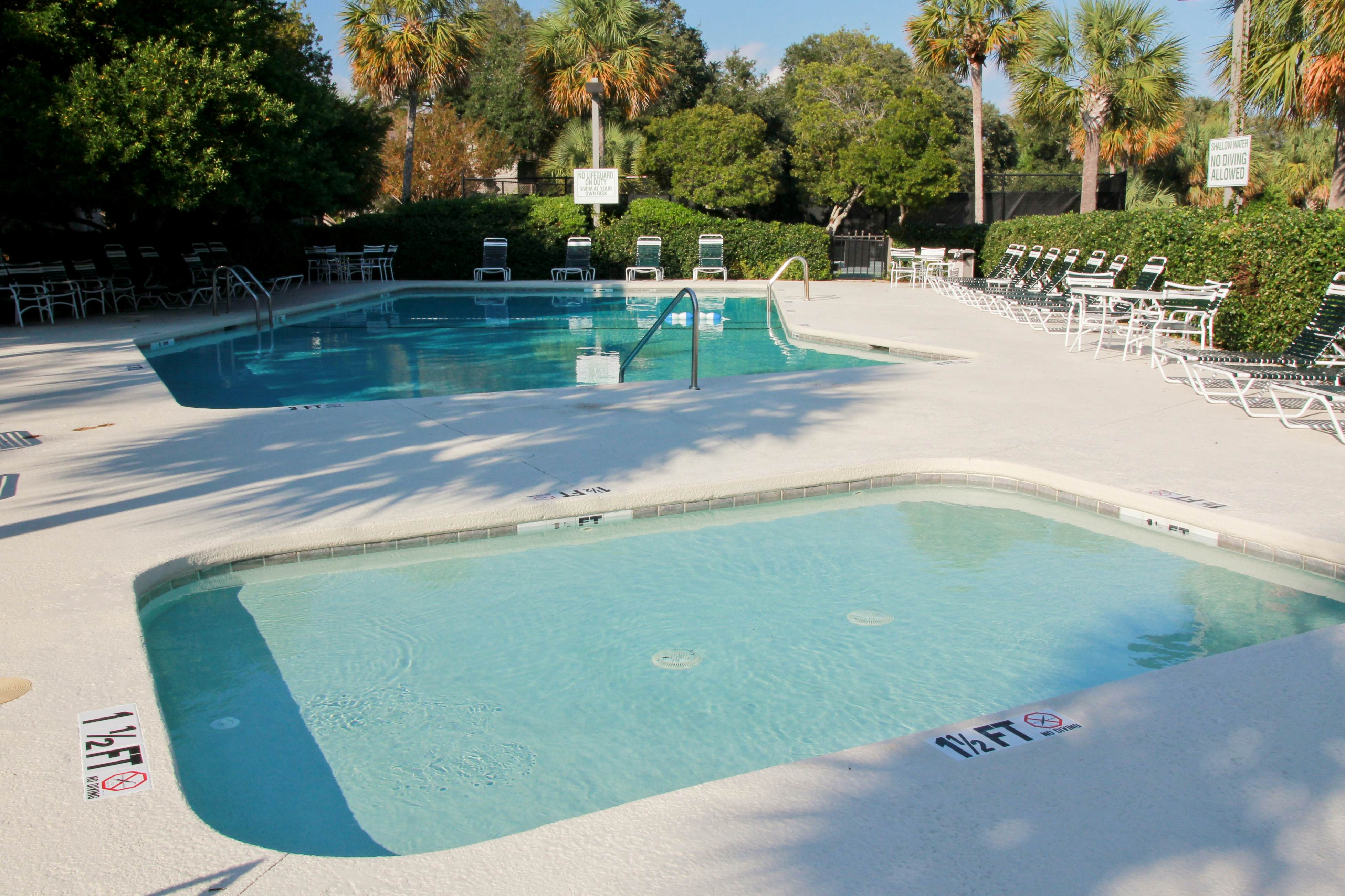 Updated townhouse with outside deck, shared pool, tennis, pickleball and beach