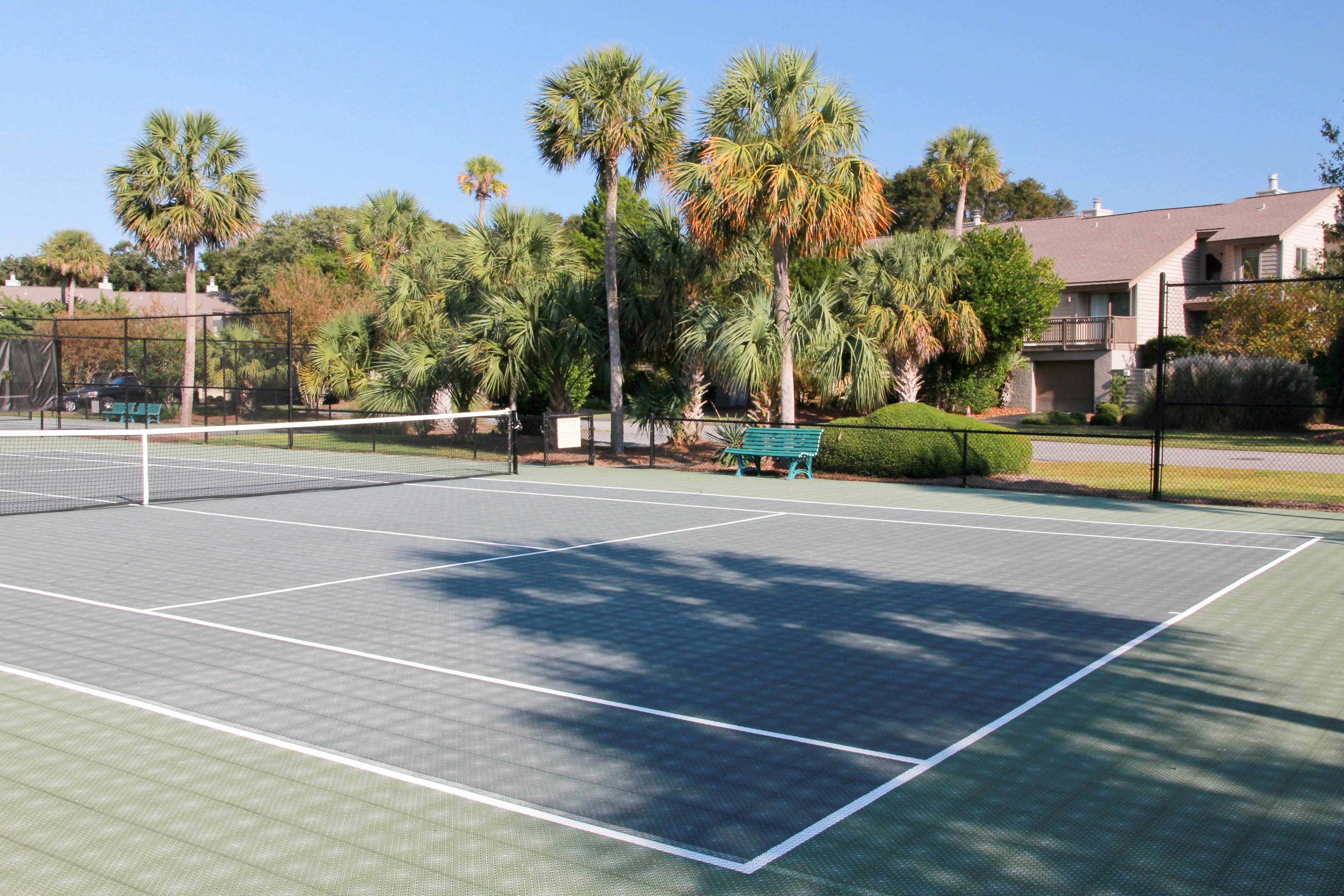 Updated townhouse with outside deck, shared pool, tennis, pickleball and beach