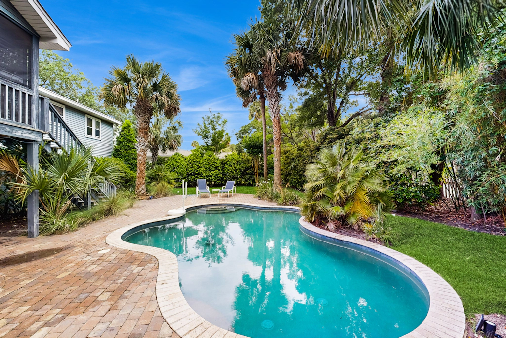 Peaceful Isle of Palms escape with heated pool,  grill and patio