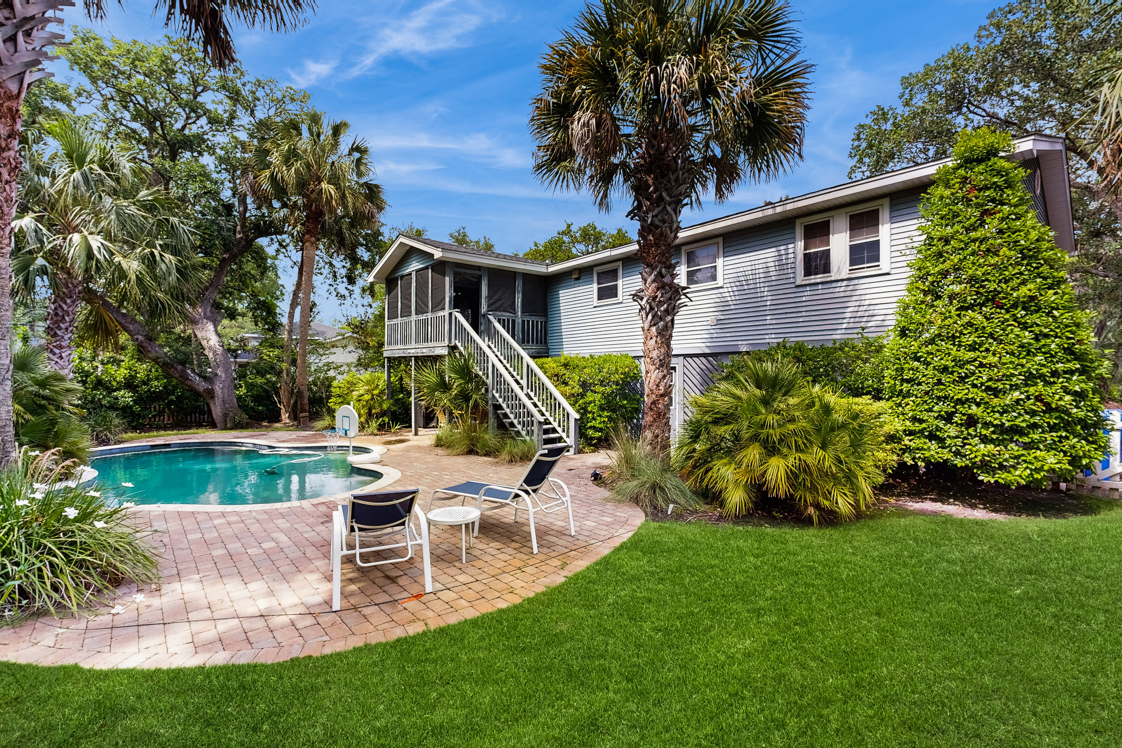 Peaceful Isle of Palms escape with heated pool,  grill and patio