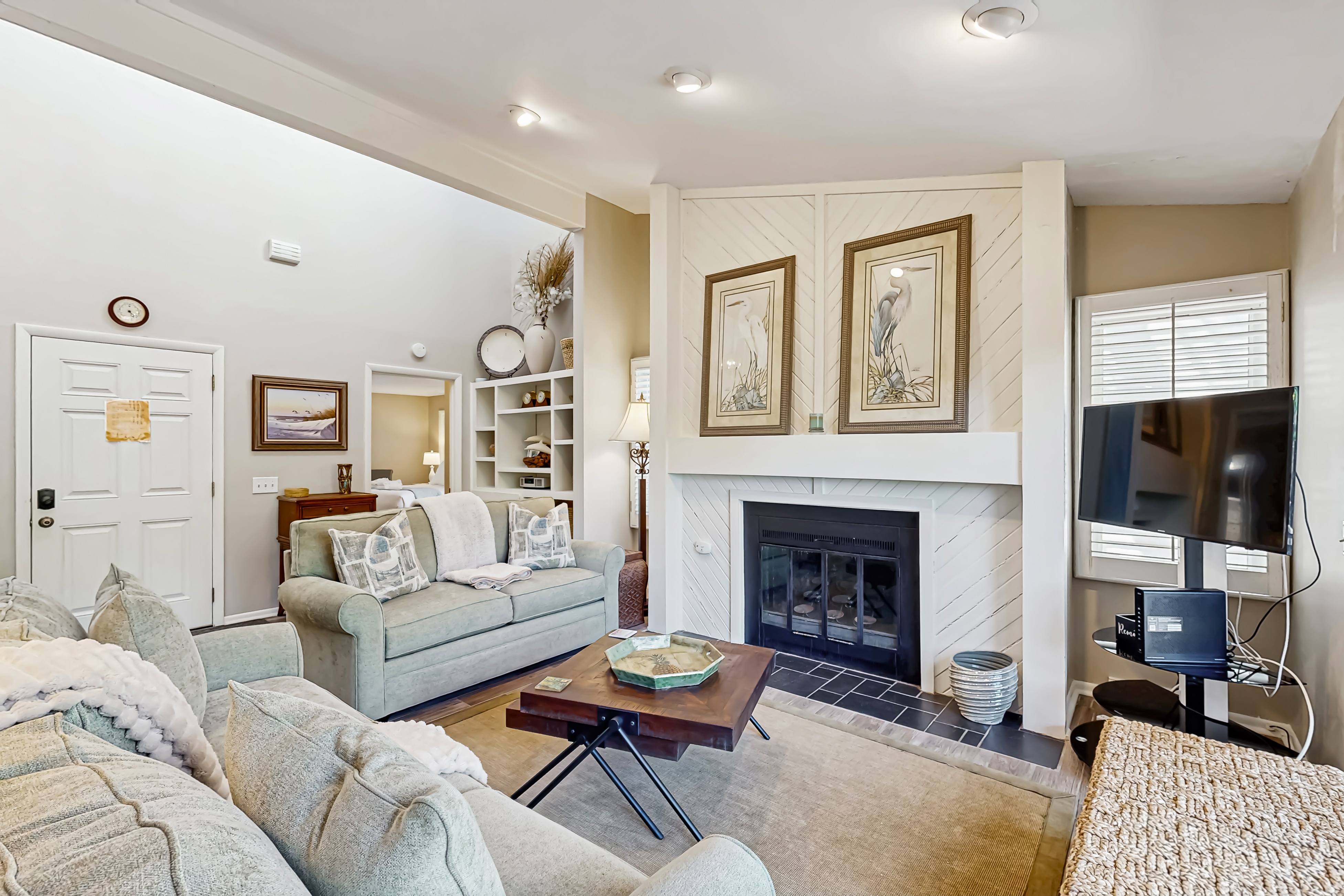 Golf course home with deck, porch & lagoon view - 1 block to beach, 1 dog OK