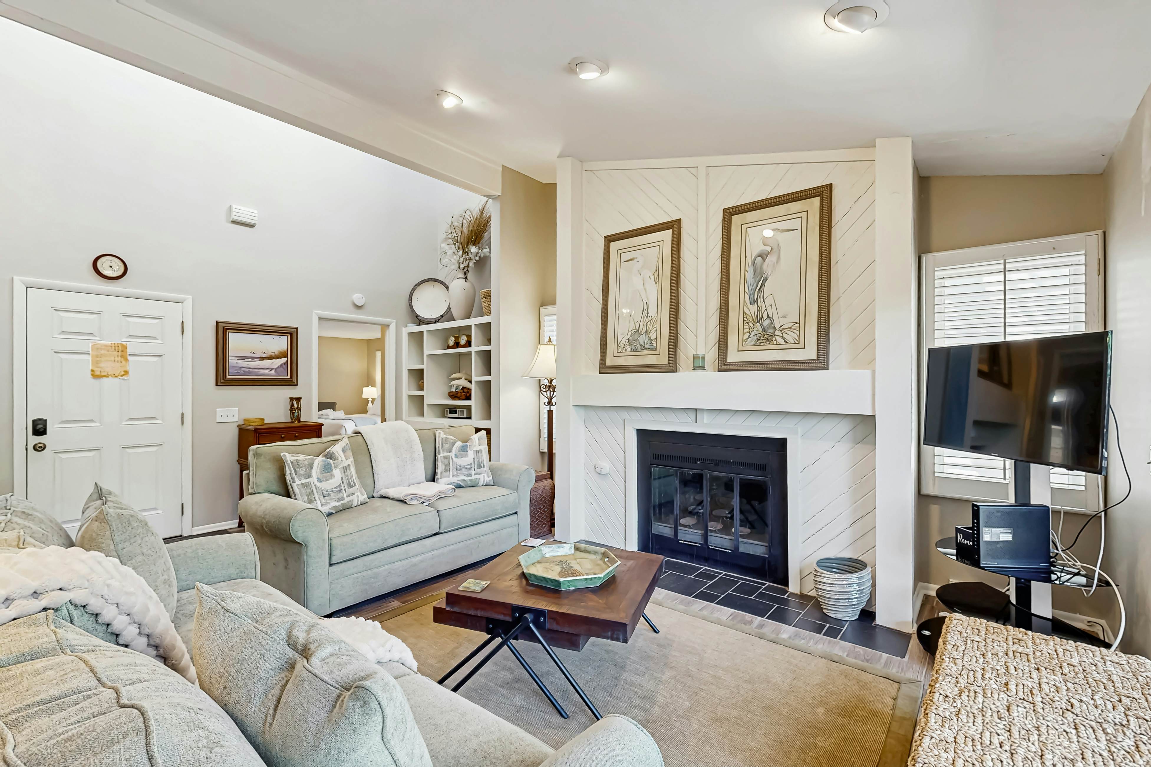 Golf course home with deck, porch & lagoon view - 1 block to beach, 1 dog OK