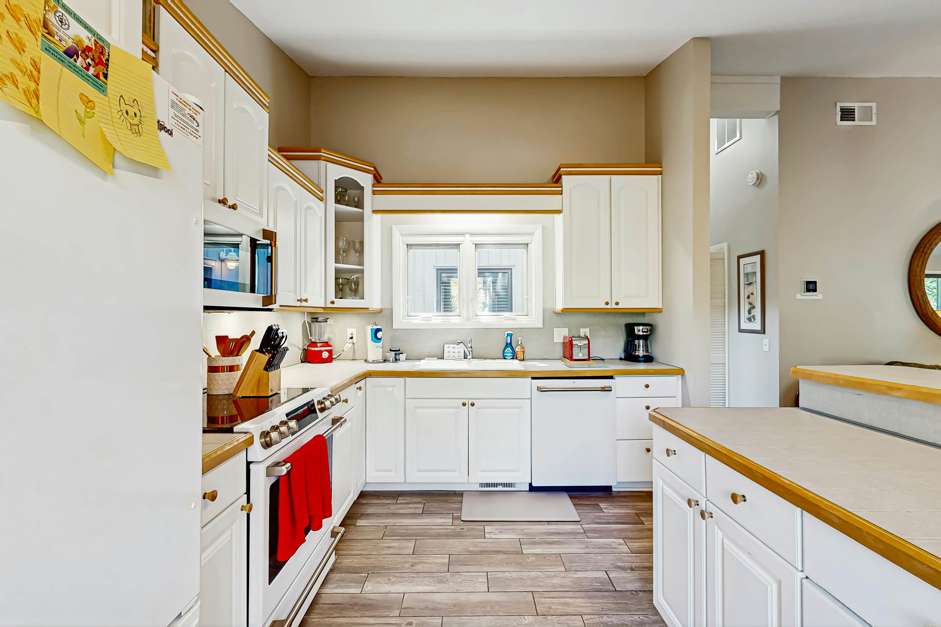 Golf course home with deck, porch & lagoon view - 1 block to beach, 1 dog OK